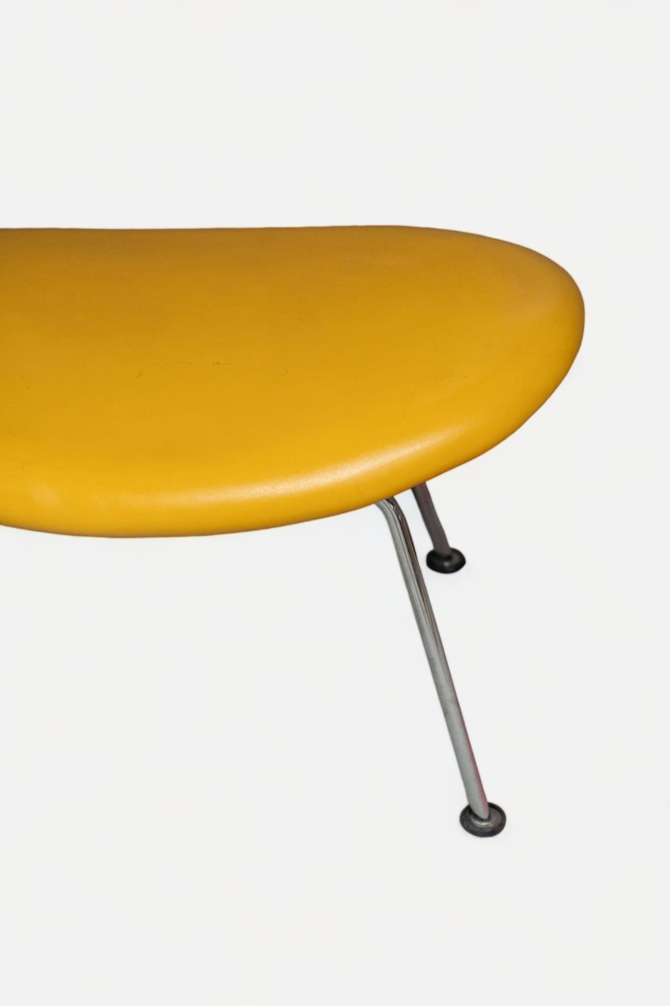 Artifort Orange Slice Design Yellow leather low stool on steel legs