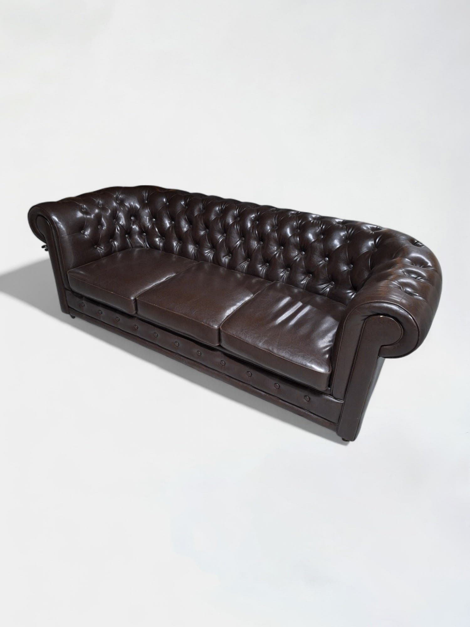 Canapé en cuir similaire au chocolat