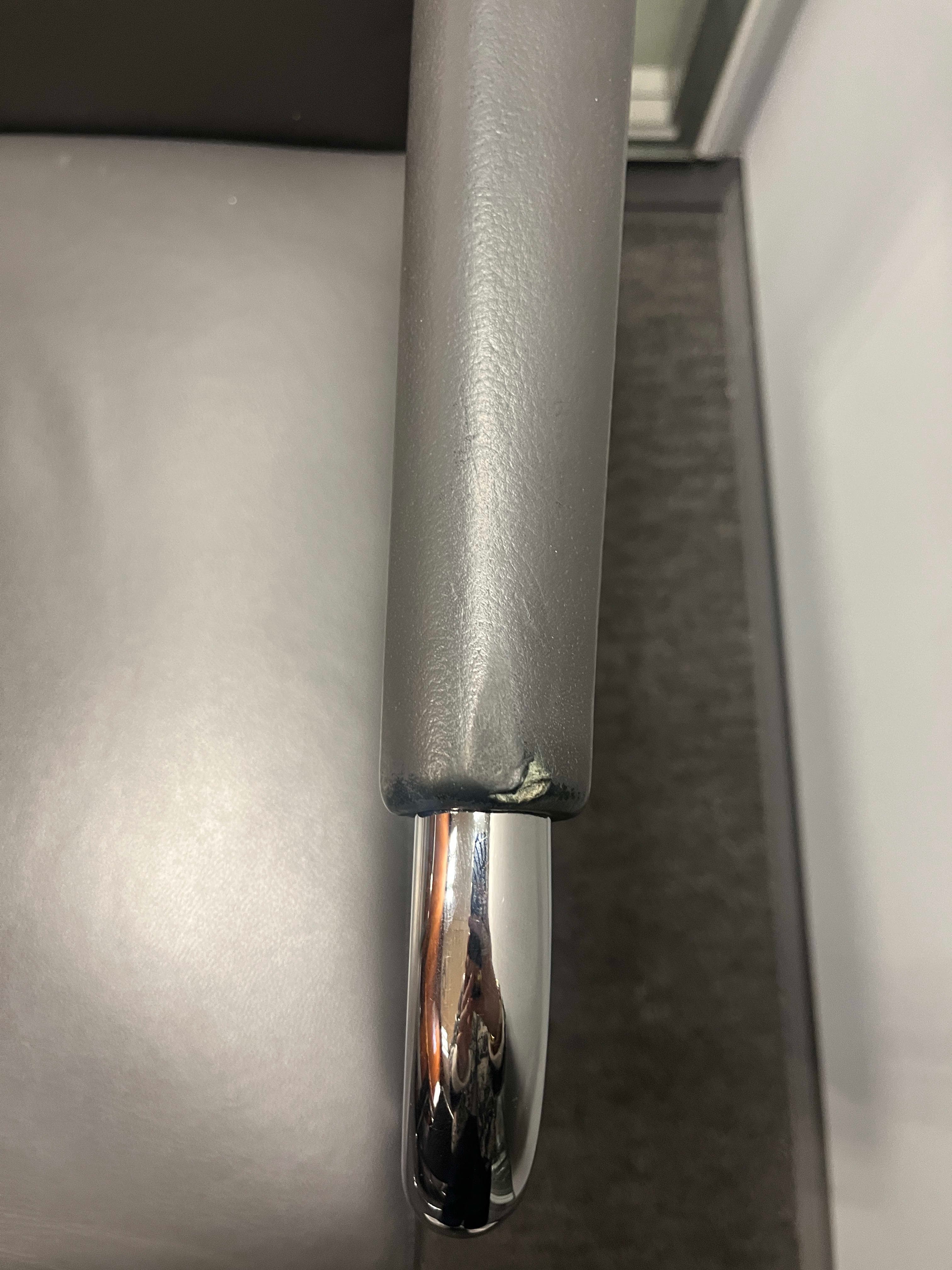 Brunner Grey leather chair with small scratches on the armrests-5
