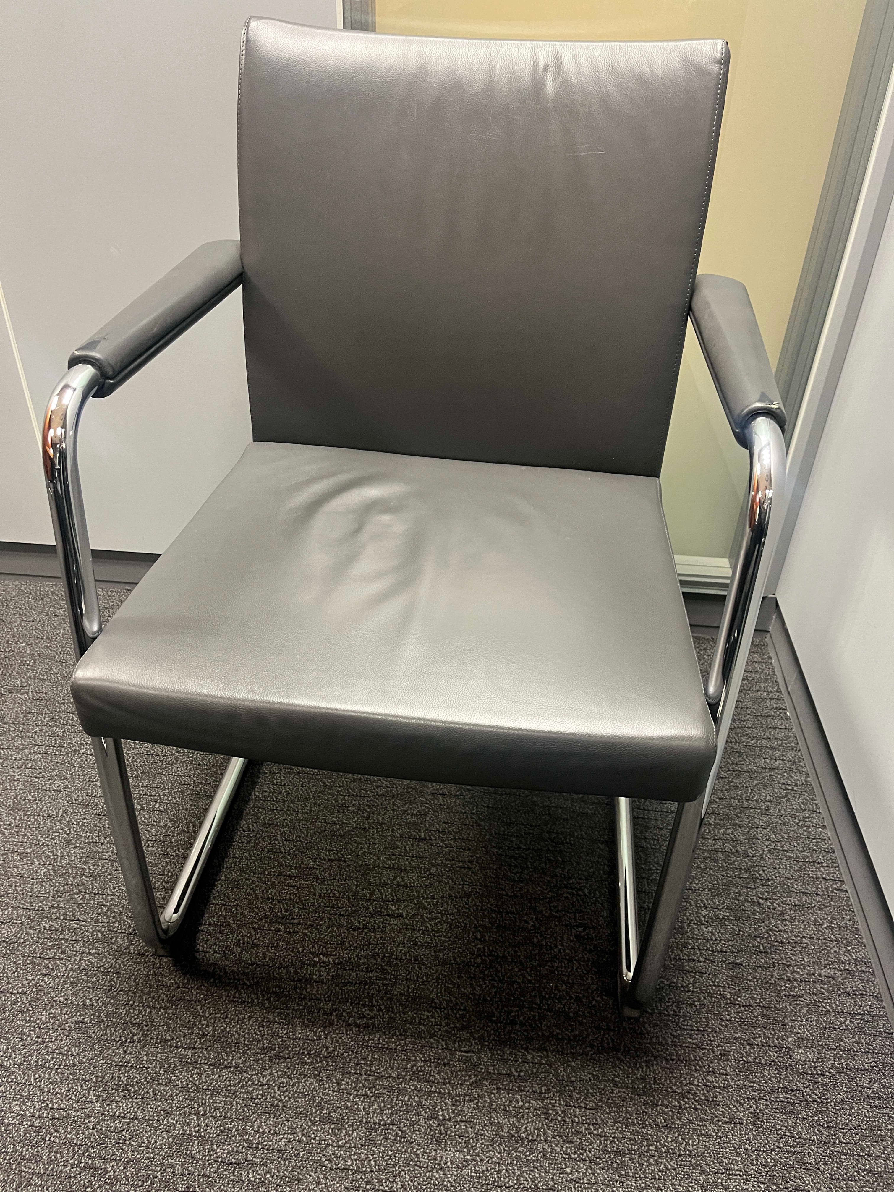 Brunner Grey leather chair with small scratches on the armrests-2