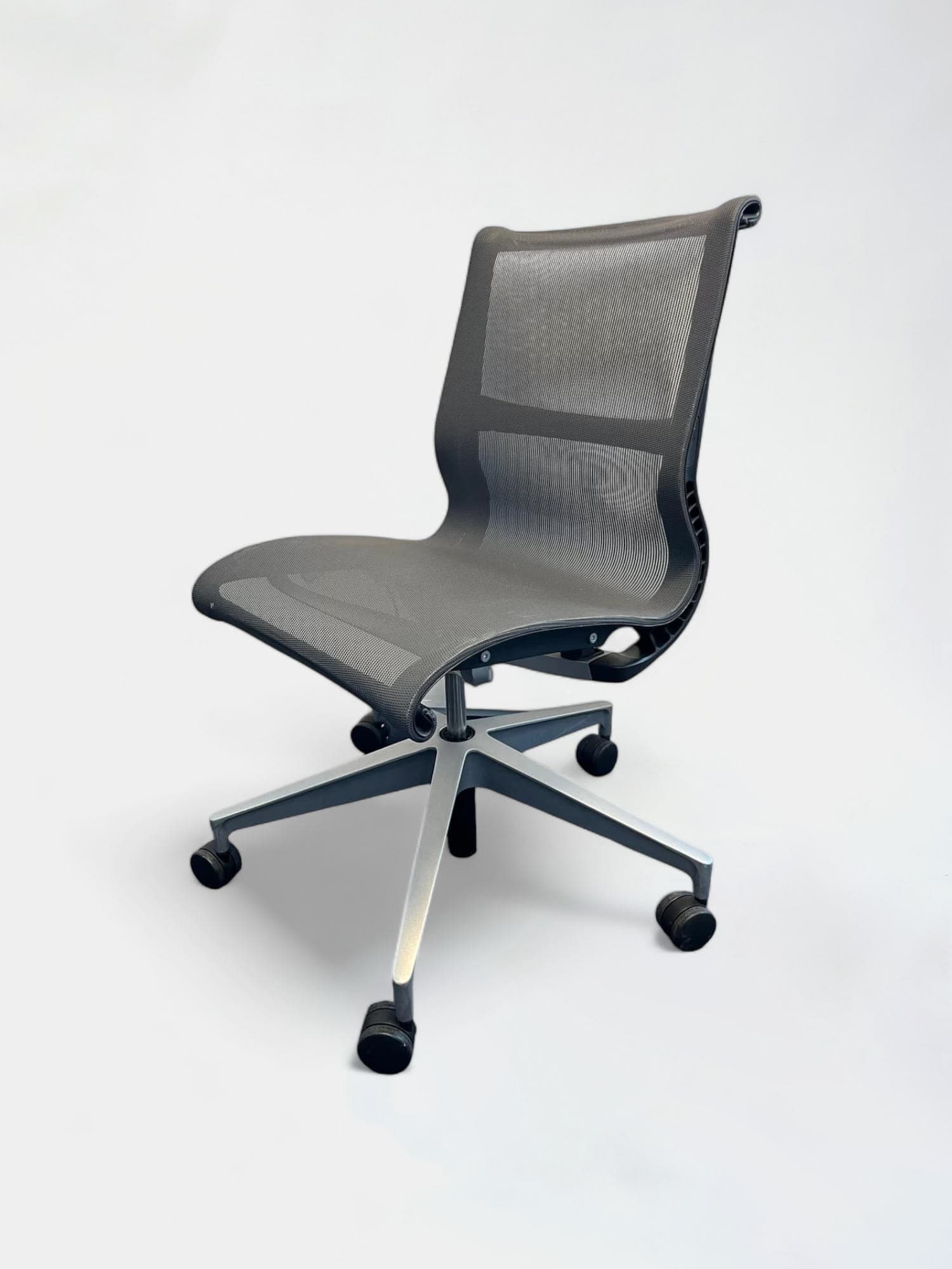 Herman Miller Setu mesh dark grey office chair without armrests on wheels-0