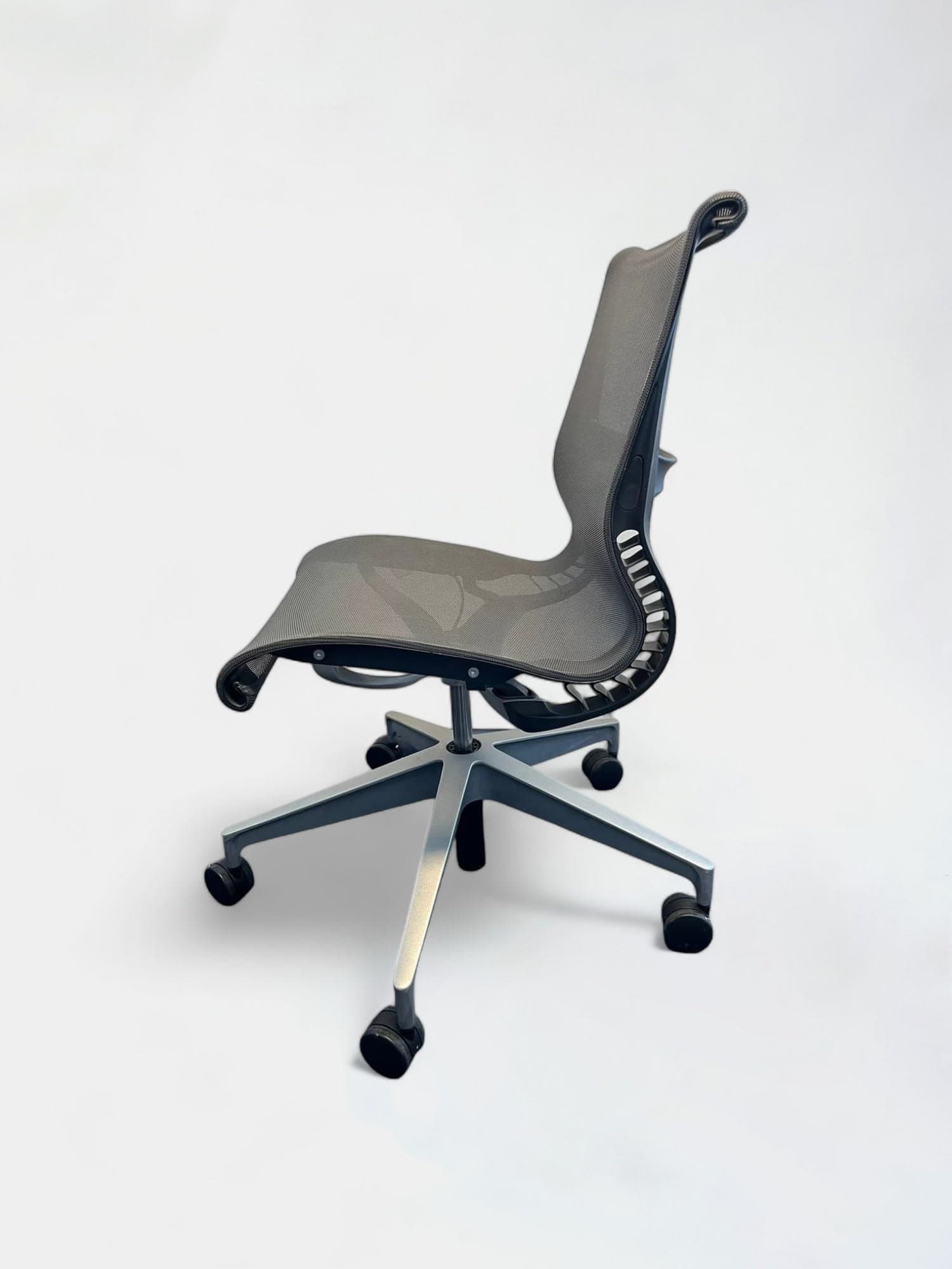 Herman Miller Setu mesh dark grey office chair without armrests on wheels-1