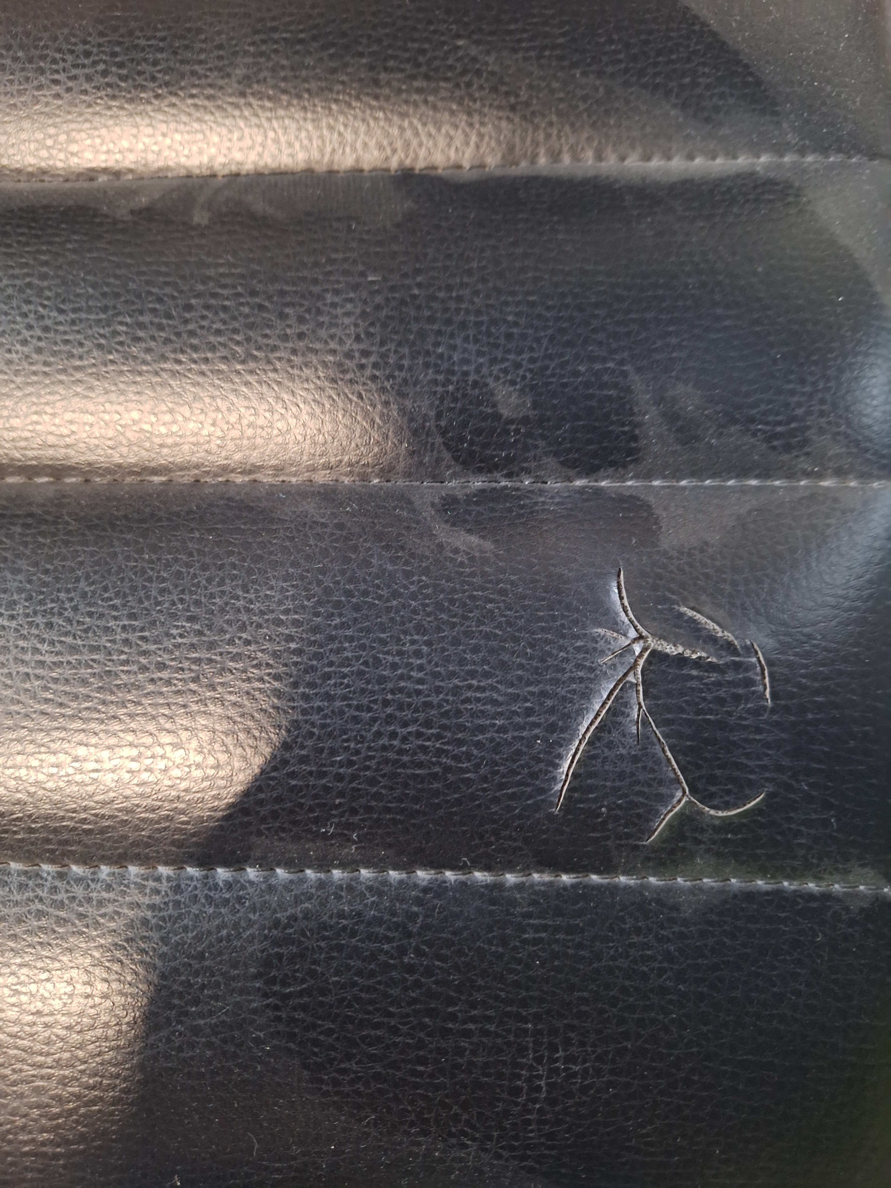 Sitland black leather office chair on wheels with damage to the seat-1
