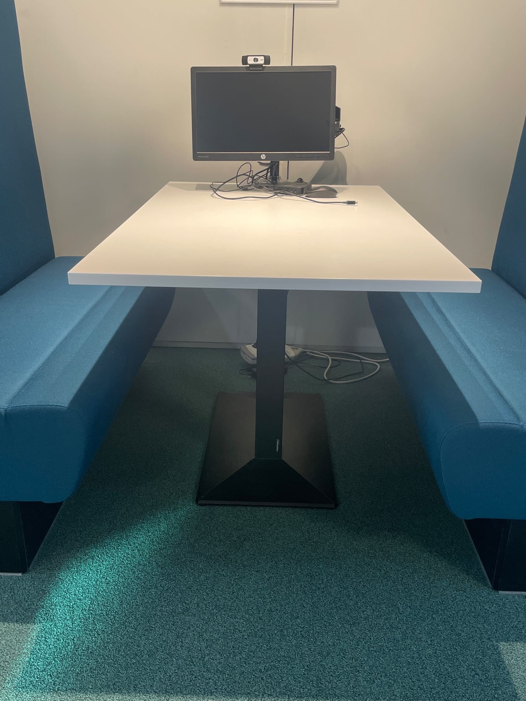 White 130cm laminate table with a black metal base for collaborative workspaces-0