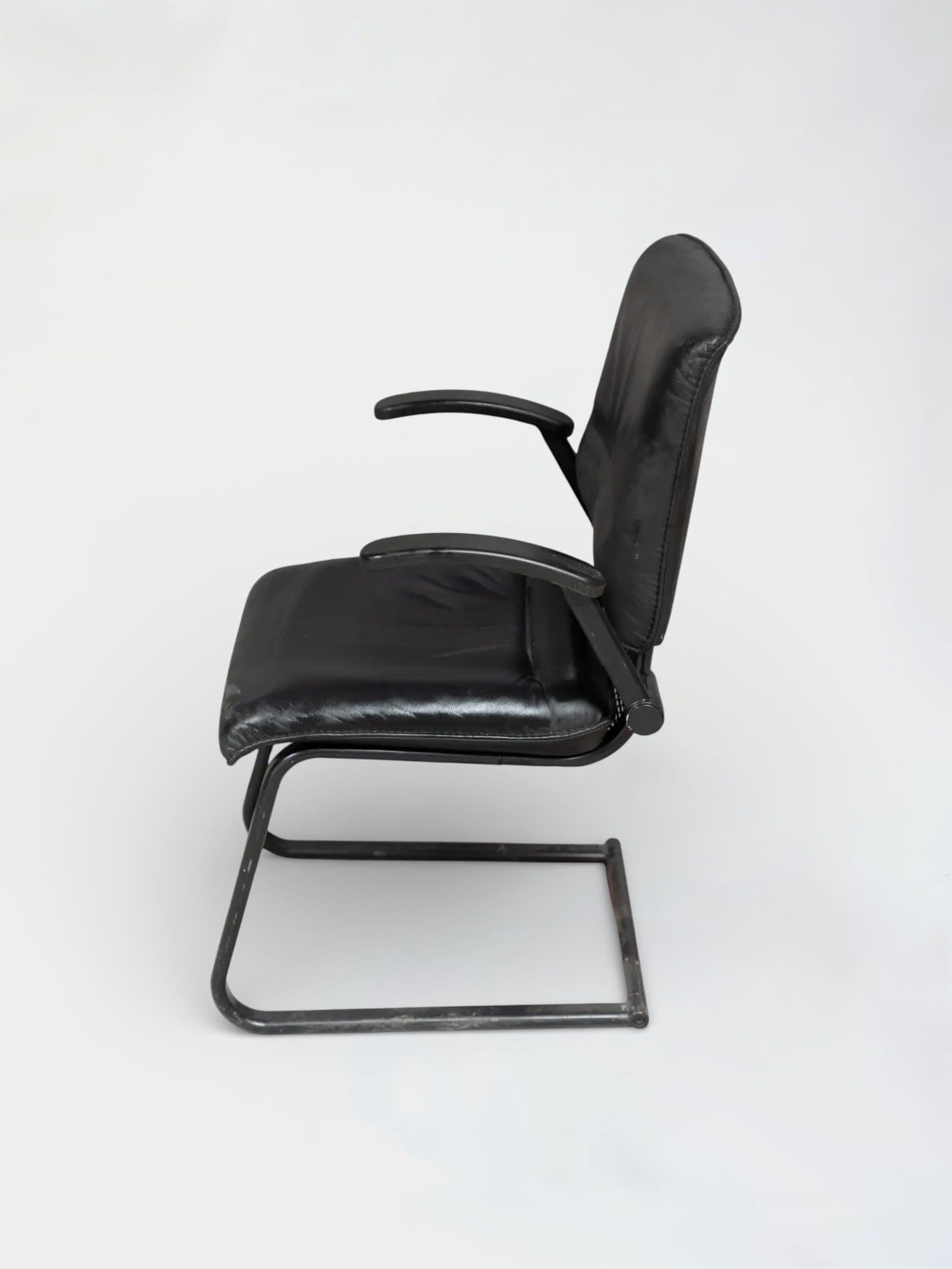 Black leather chair on black legs-3