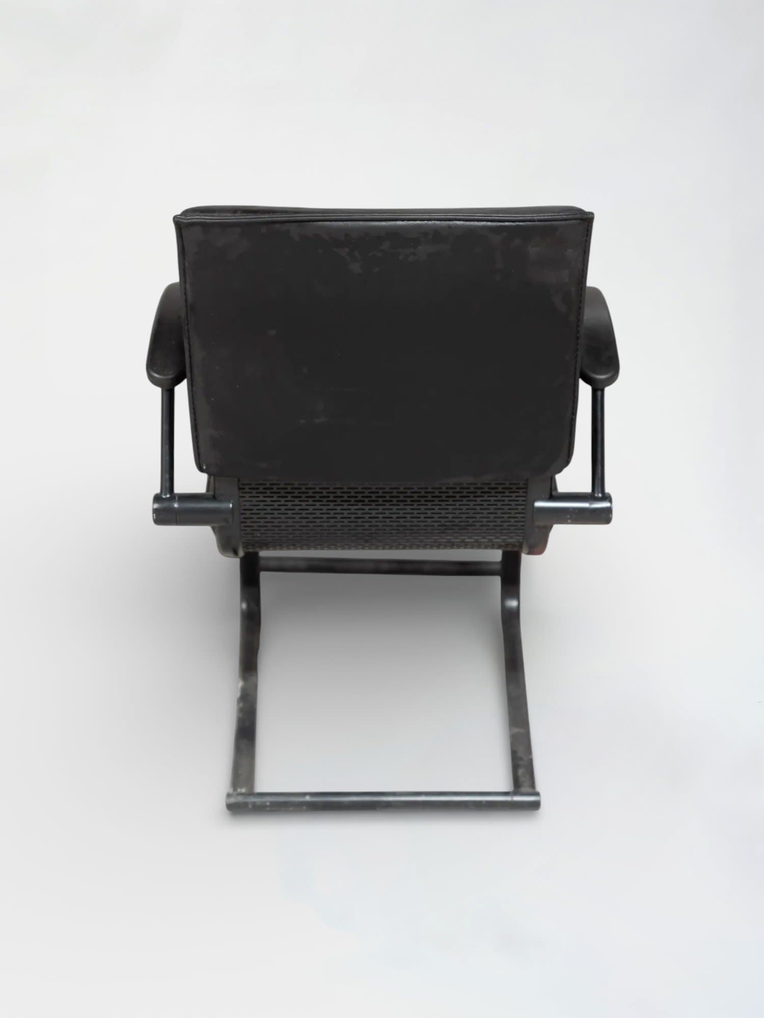 Black leather chair on black legs-2