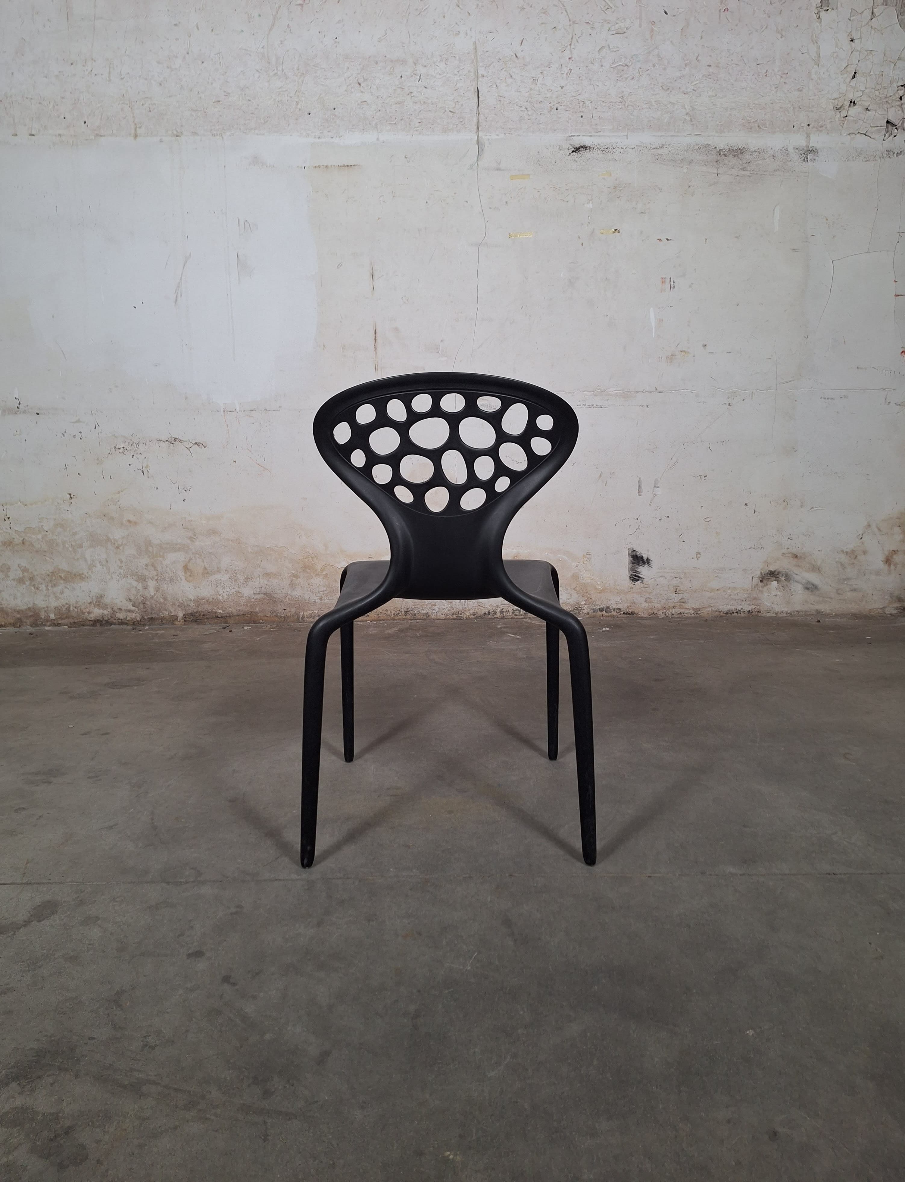 Moroso Supernatural black stackable design chairs by Ross Lovegrove-3