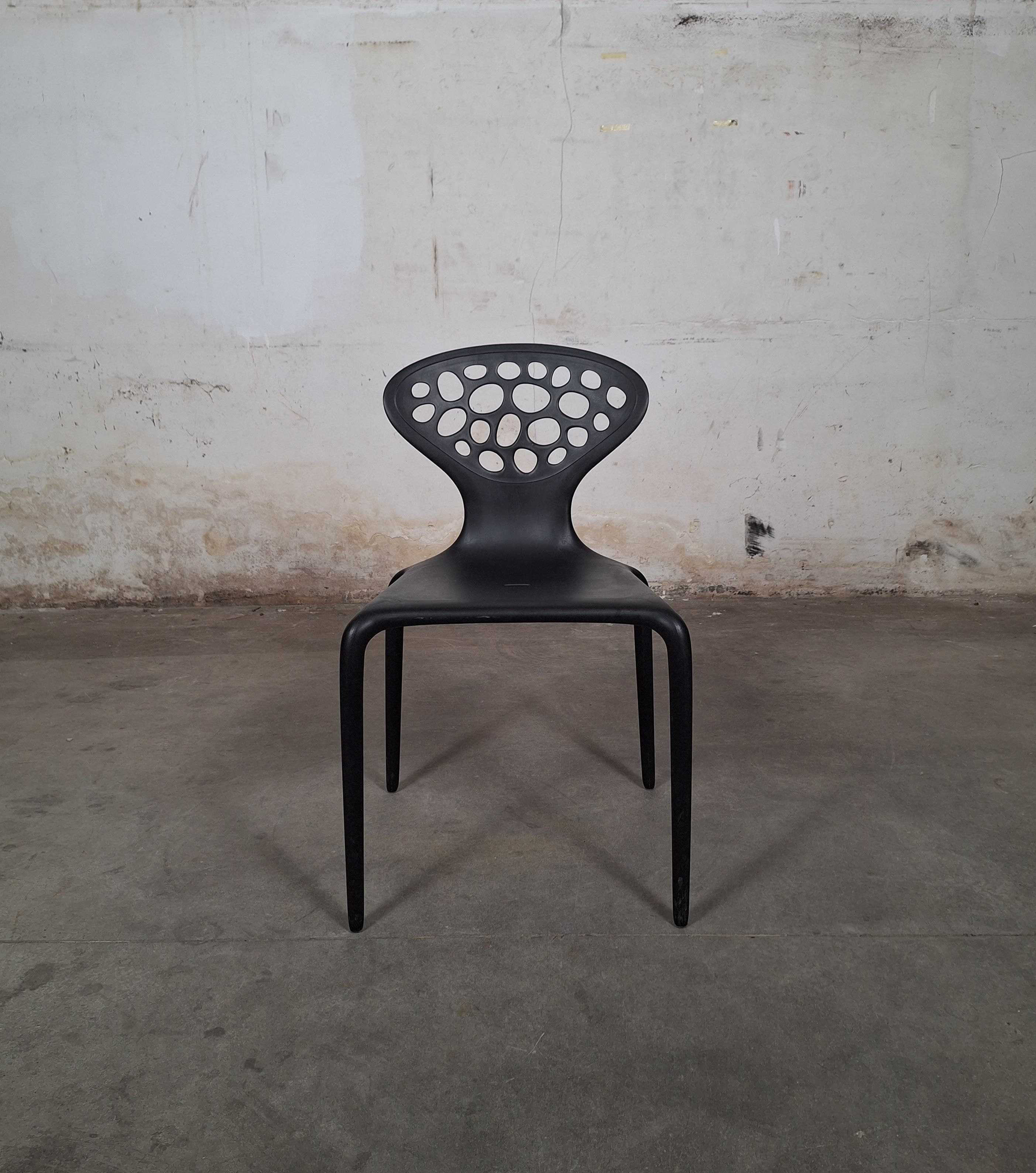Moroso Supernatural black stackable design chairs by Ross Lovegrove-1