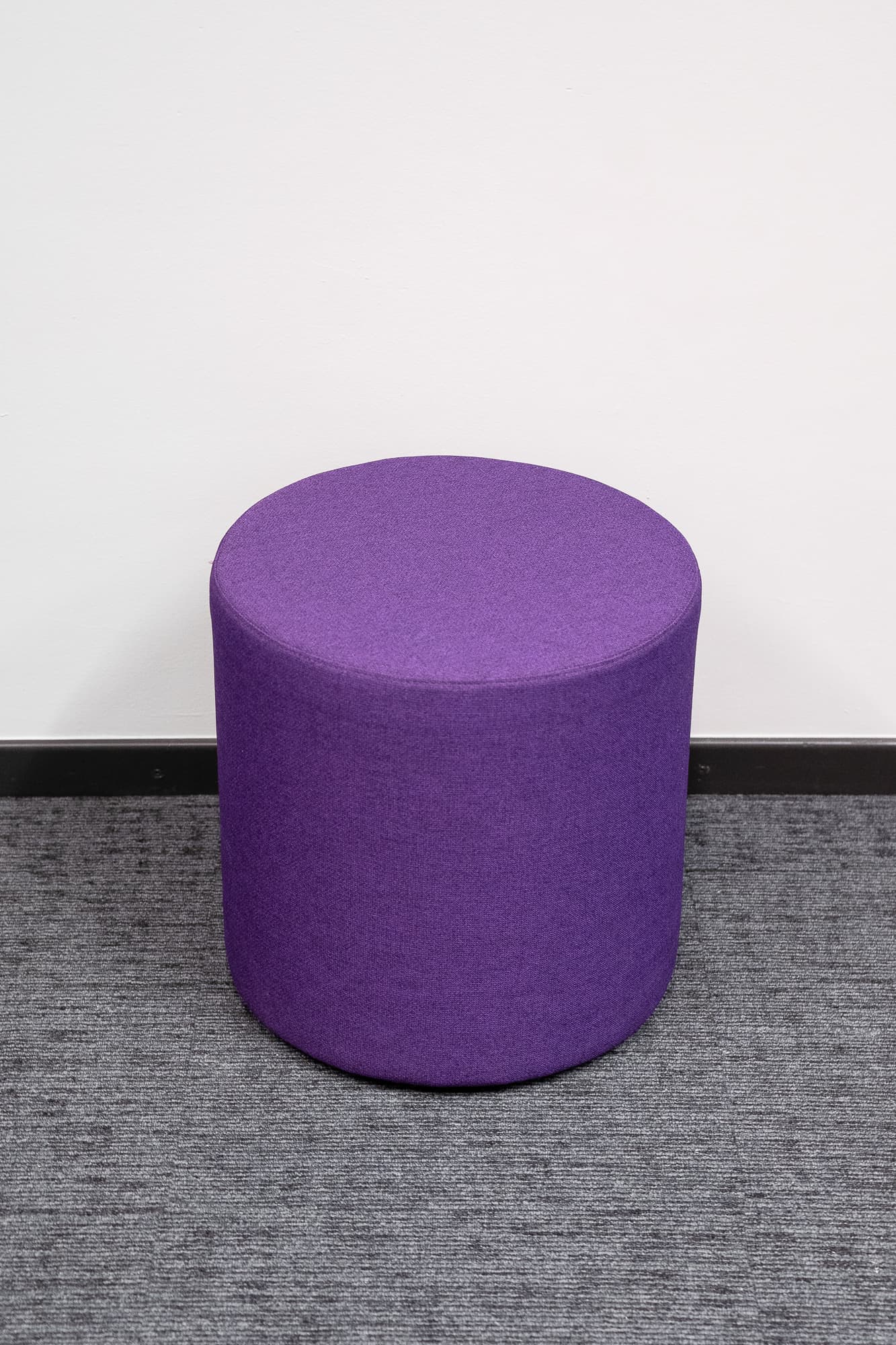 Round dark mauve pouffe-1