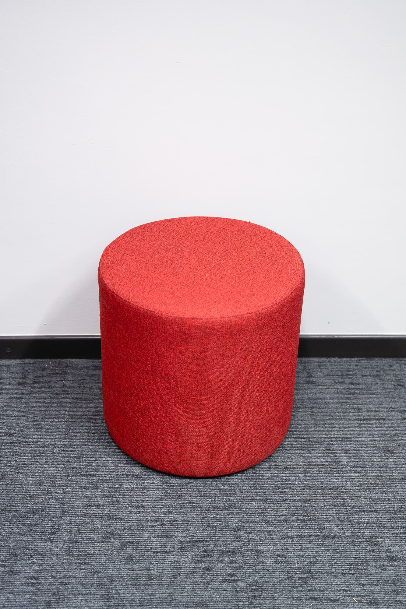Round earth-red pouffe-1