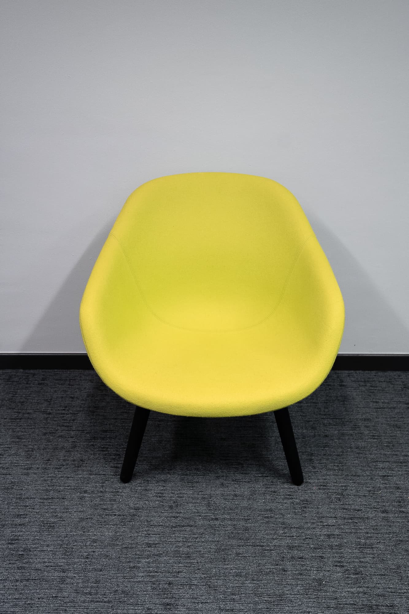 Yellow/green flash armchair on dark wooden legs-0