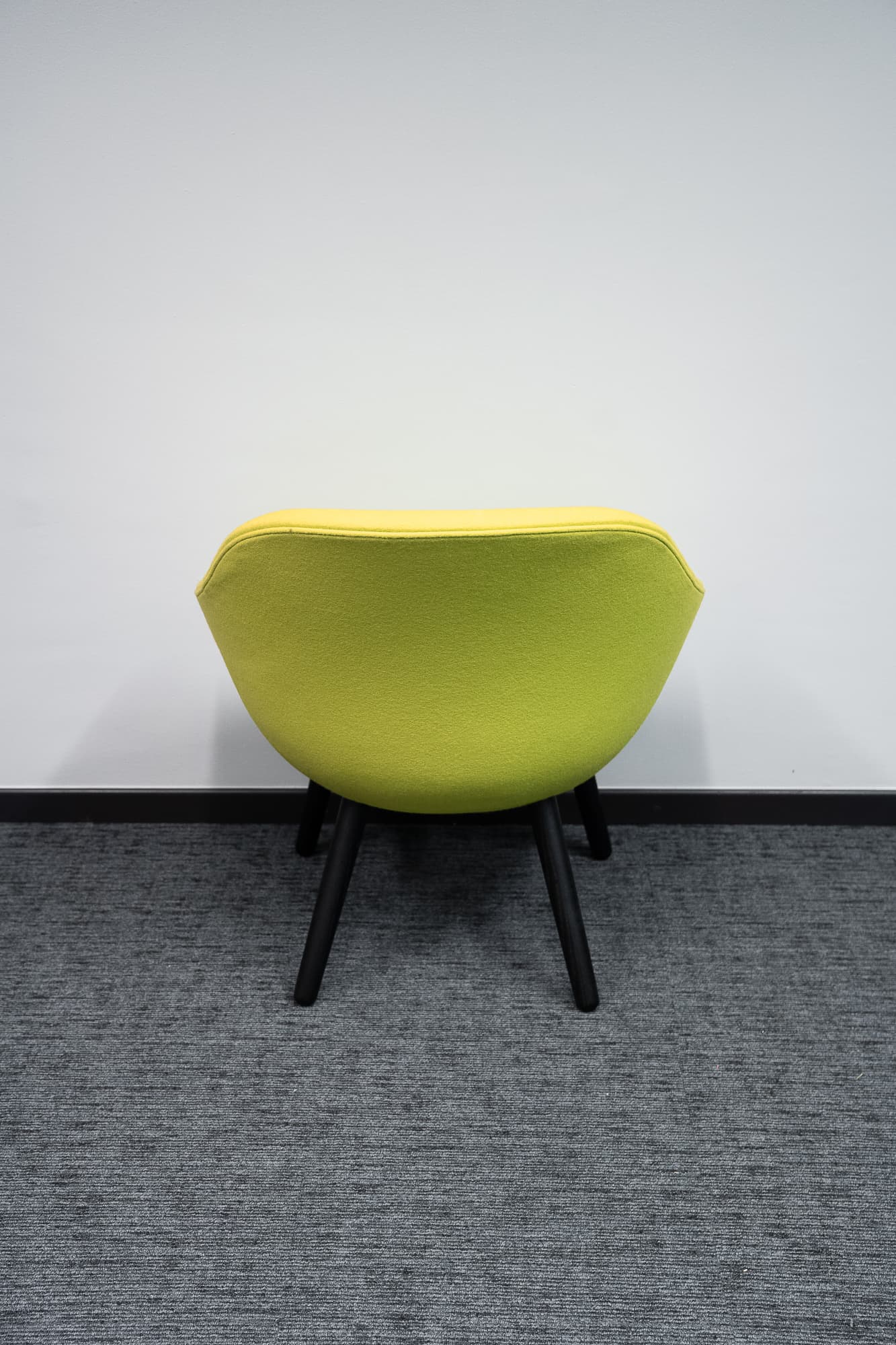 Yellow/green flash armchair on dark wooden legs-2