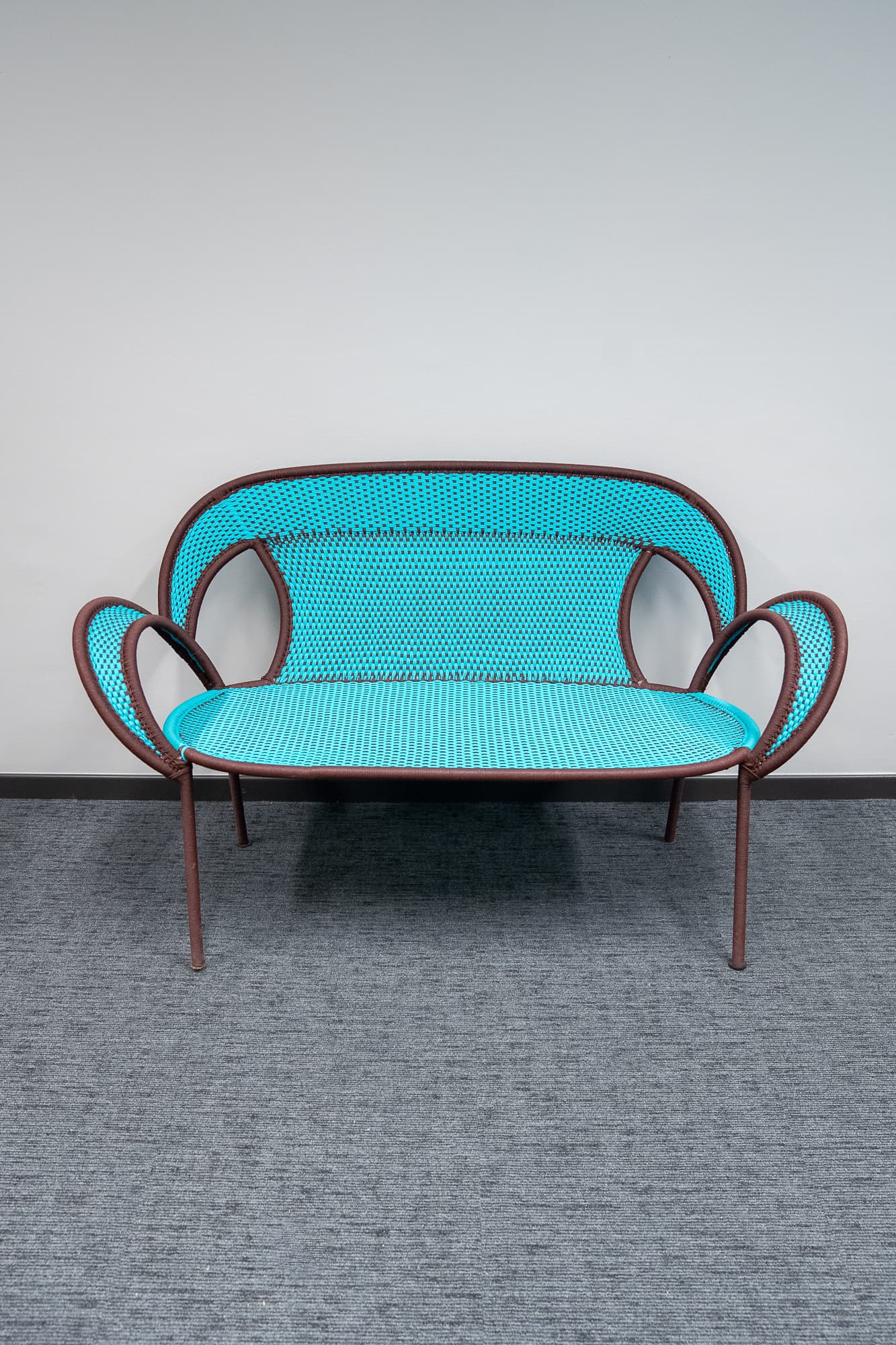 Turquoise and brown wicker sofa-0