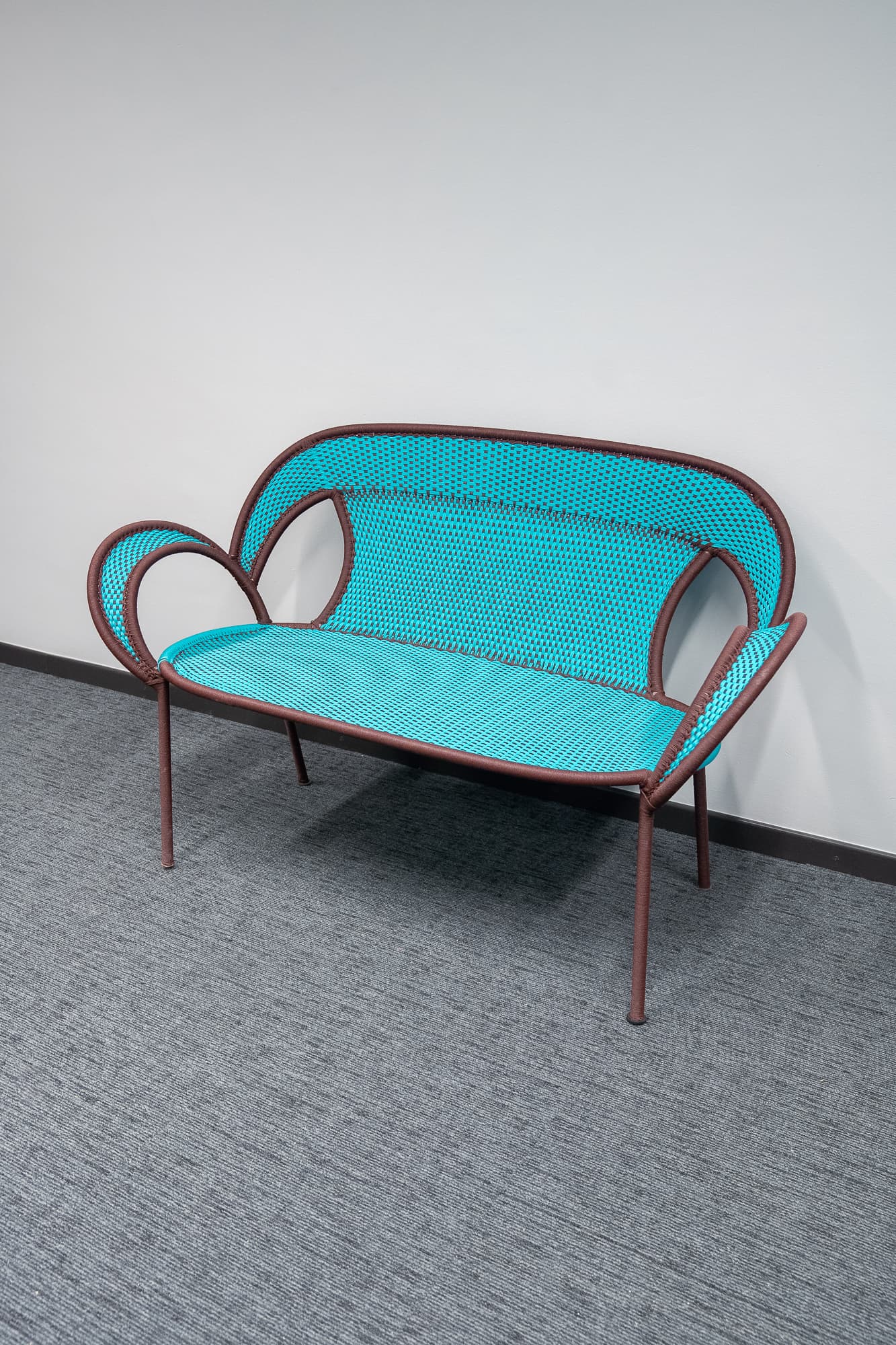 Turquoise and brown wicker sofa-1