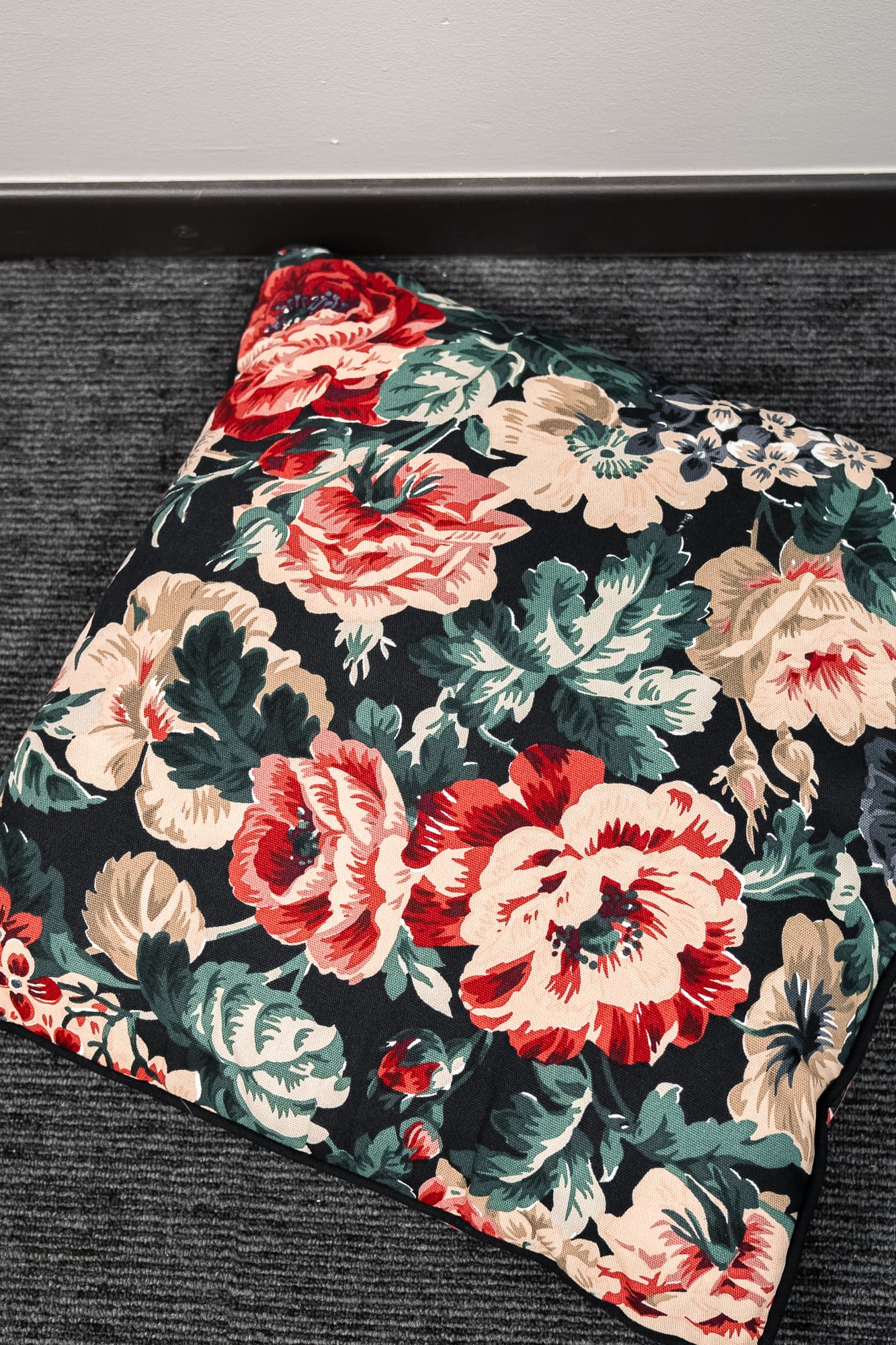 black cushion with floral motifs-1