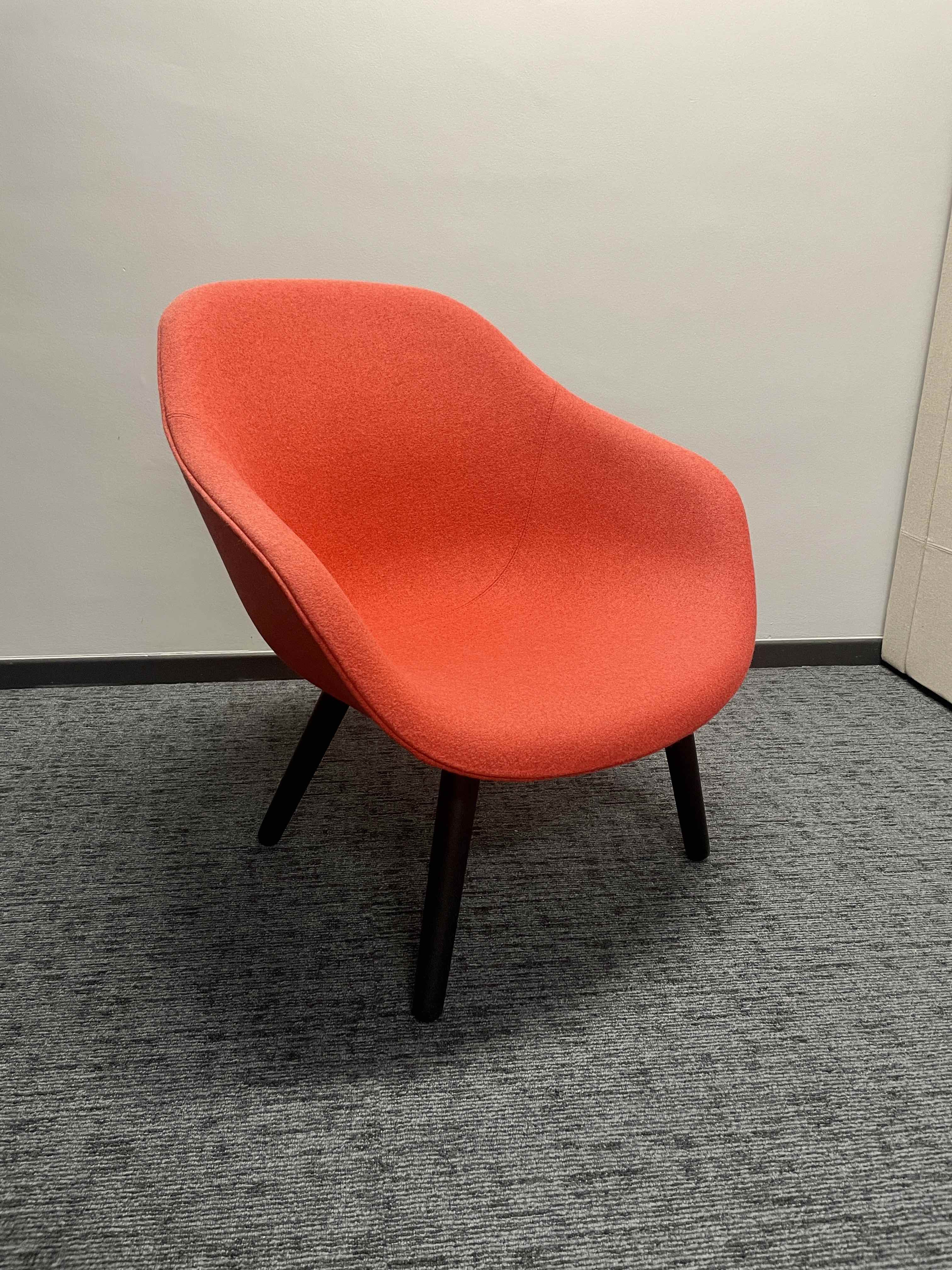 Light pink-red armchair with black wooden legs-0