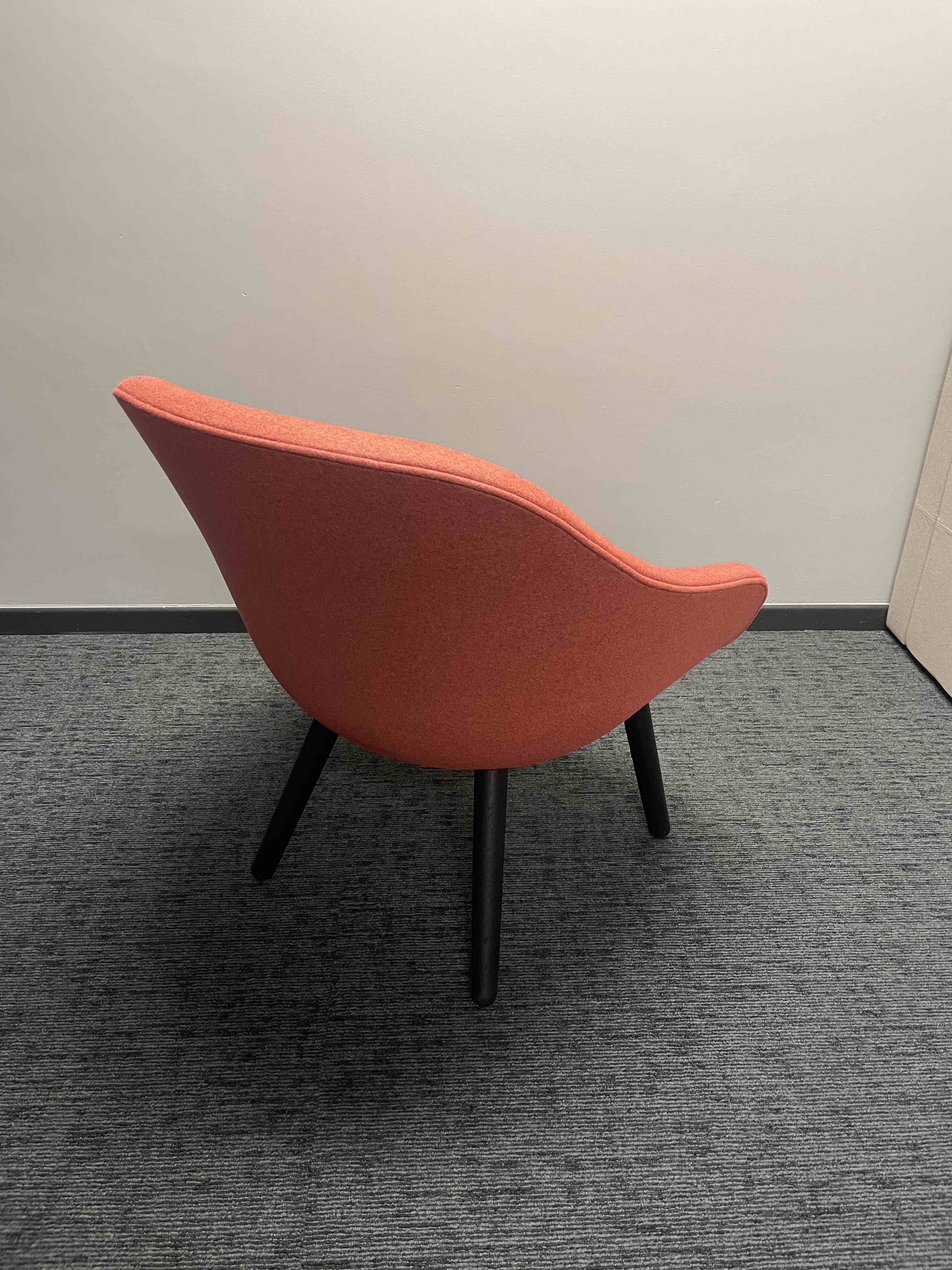 Light pink-red armchair with black wooden legs-1