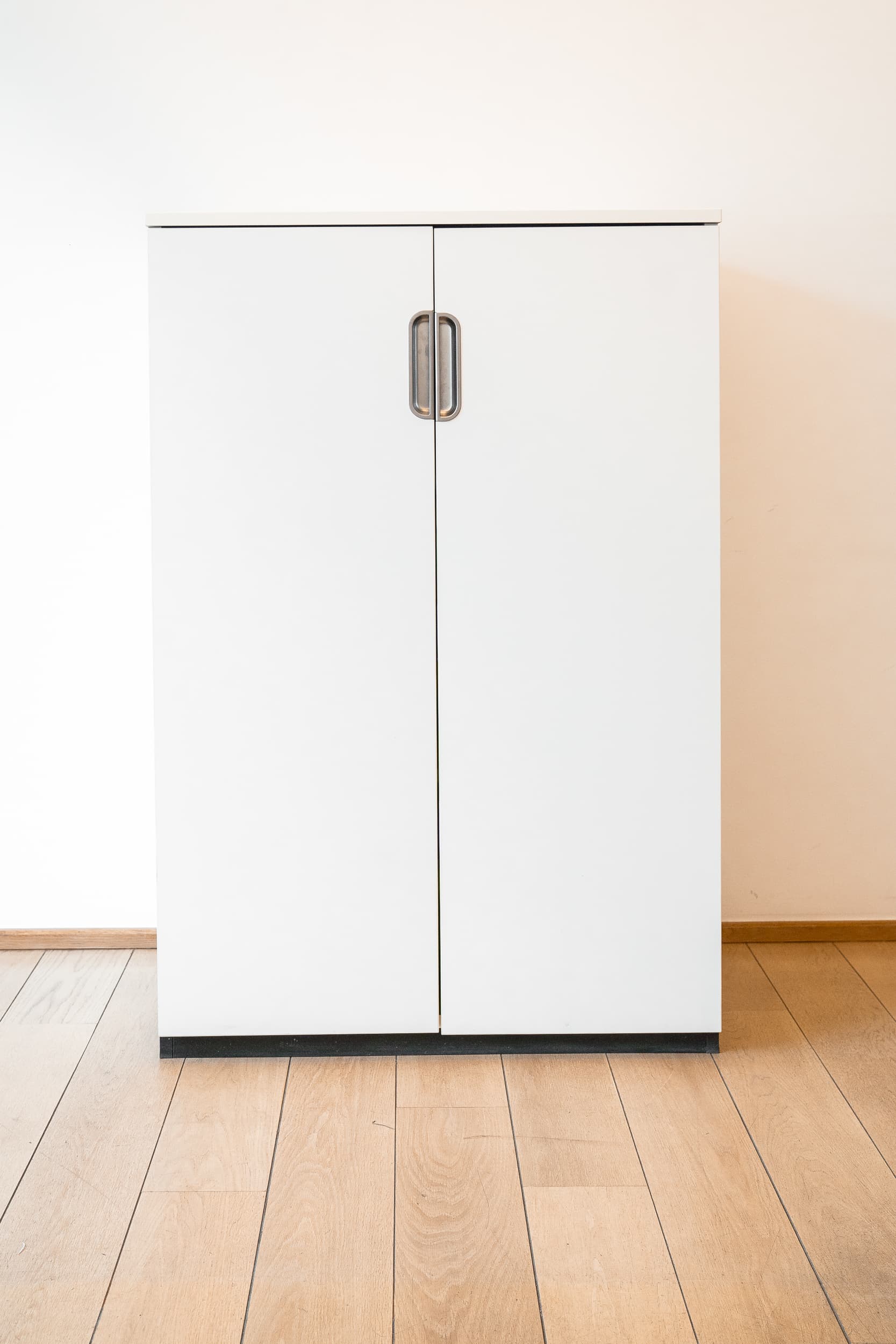 IKEA Tall white cupboards with metal handles-0