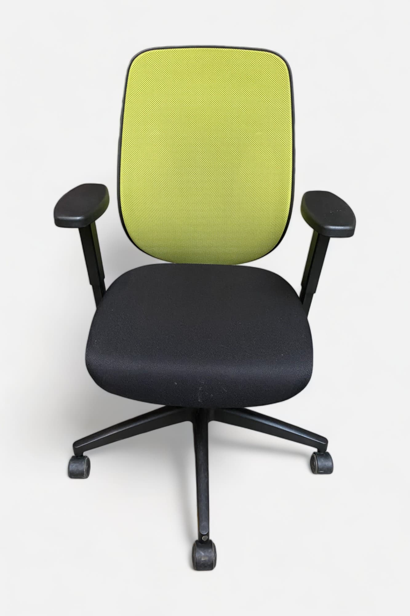 Giroflex Ergonomic adjustable green and black office chair on wheels