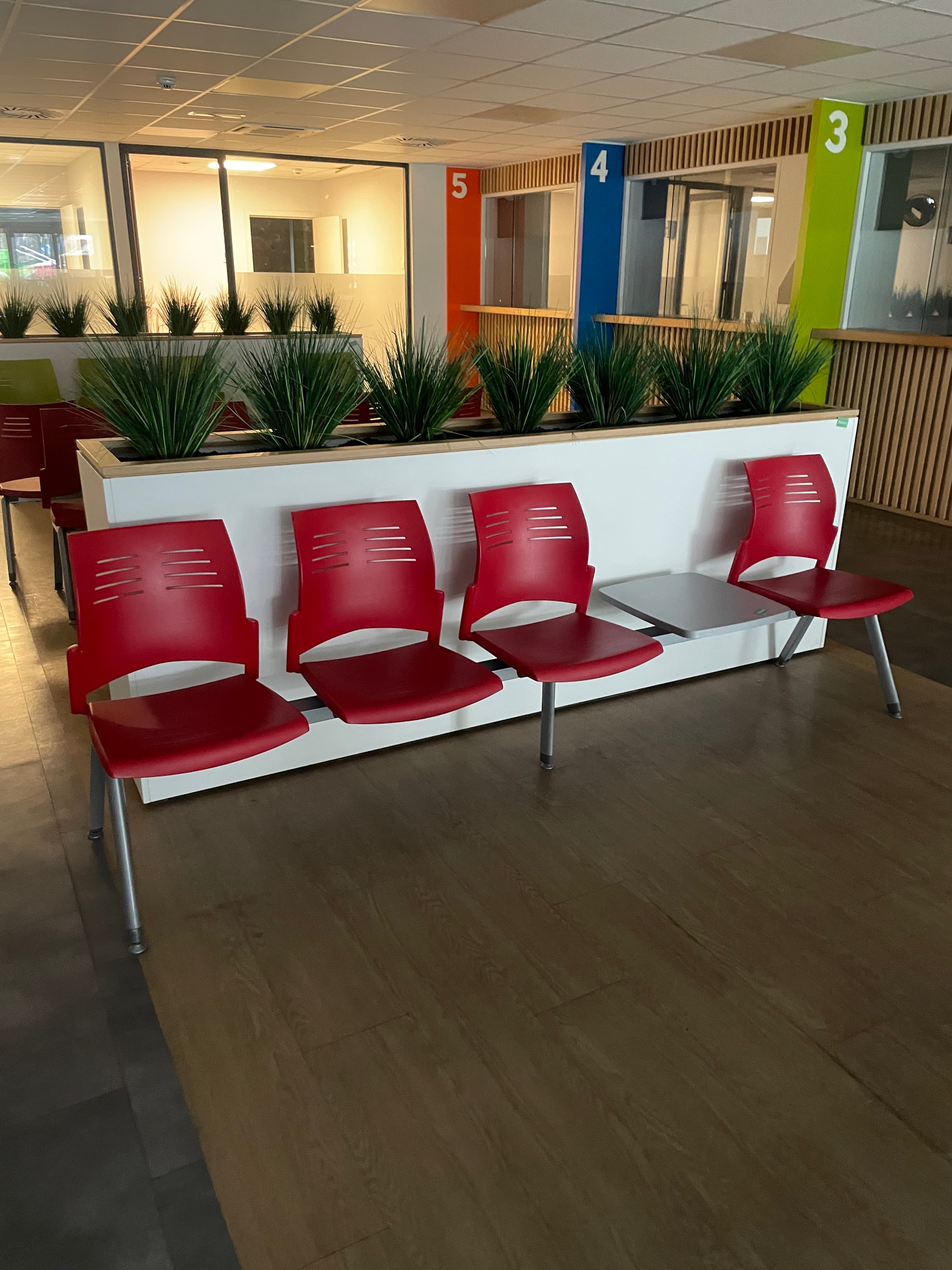 Spacio Berhin 4 red chairs waiting room-0