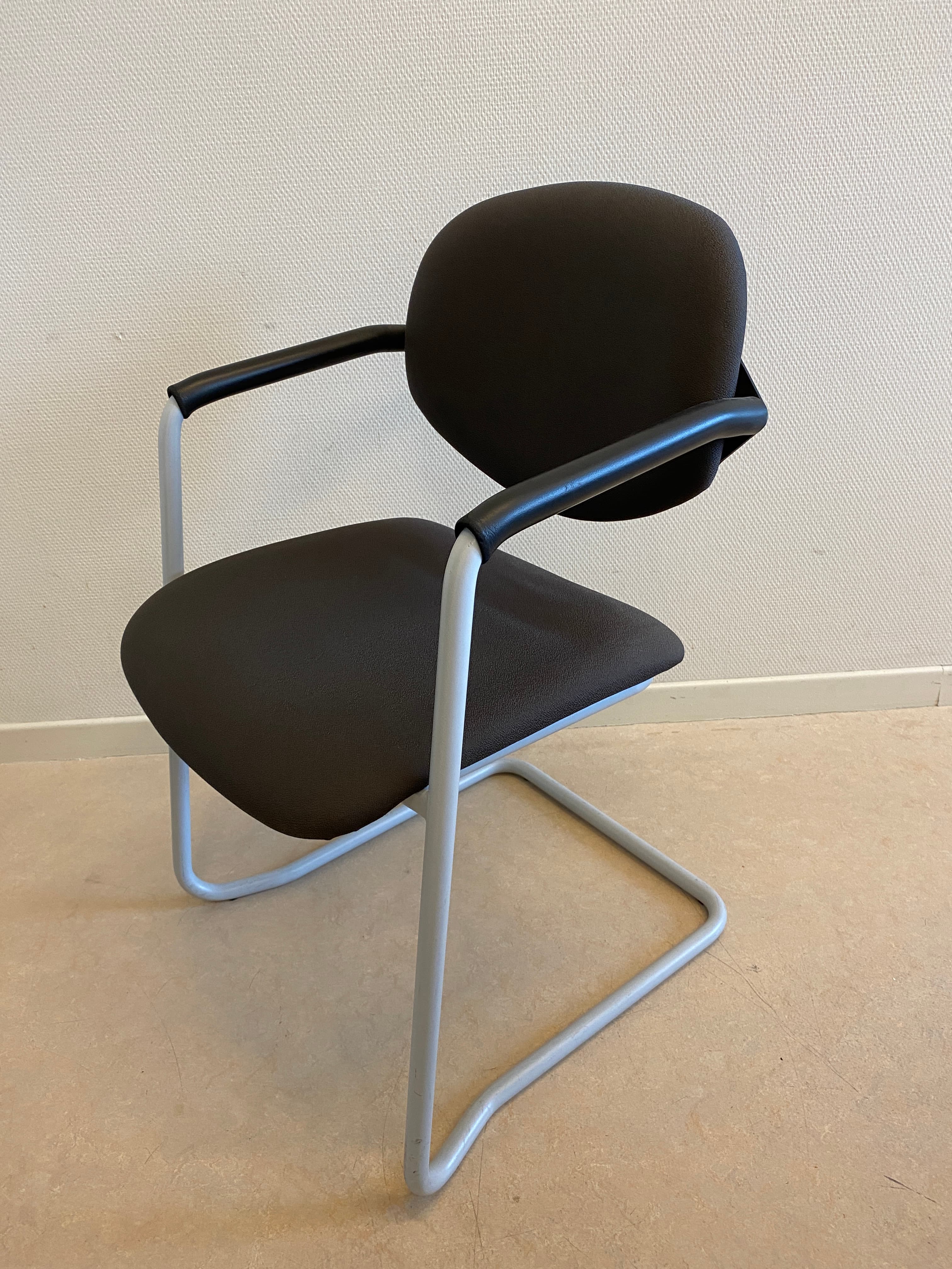 Stackable Dark brown Grey meeting chair on grey legs-0