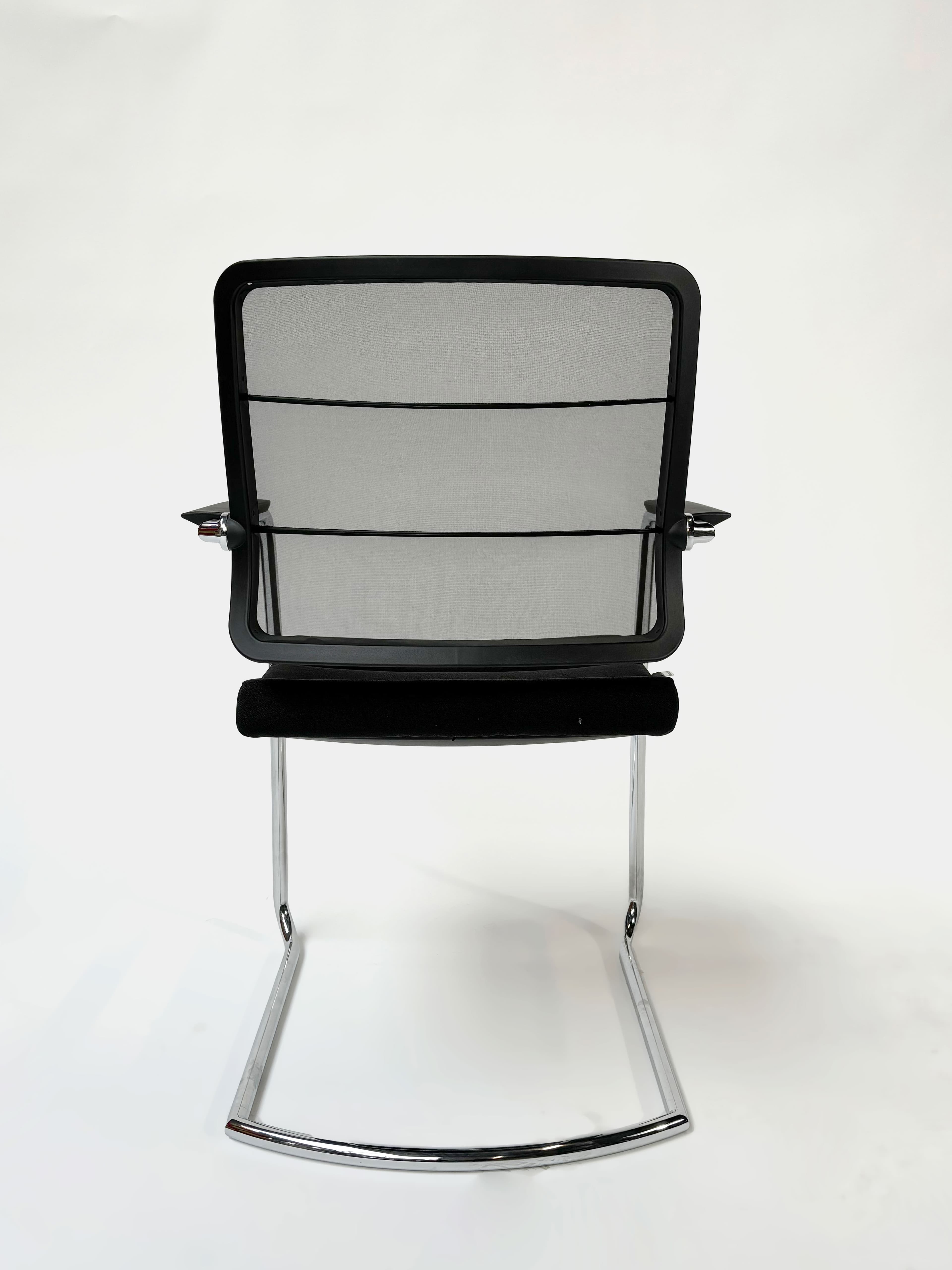 INTERSTUHL Black cushioned chair with mesh back-6
