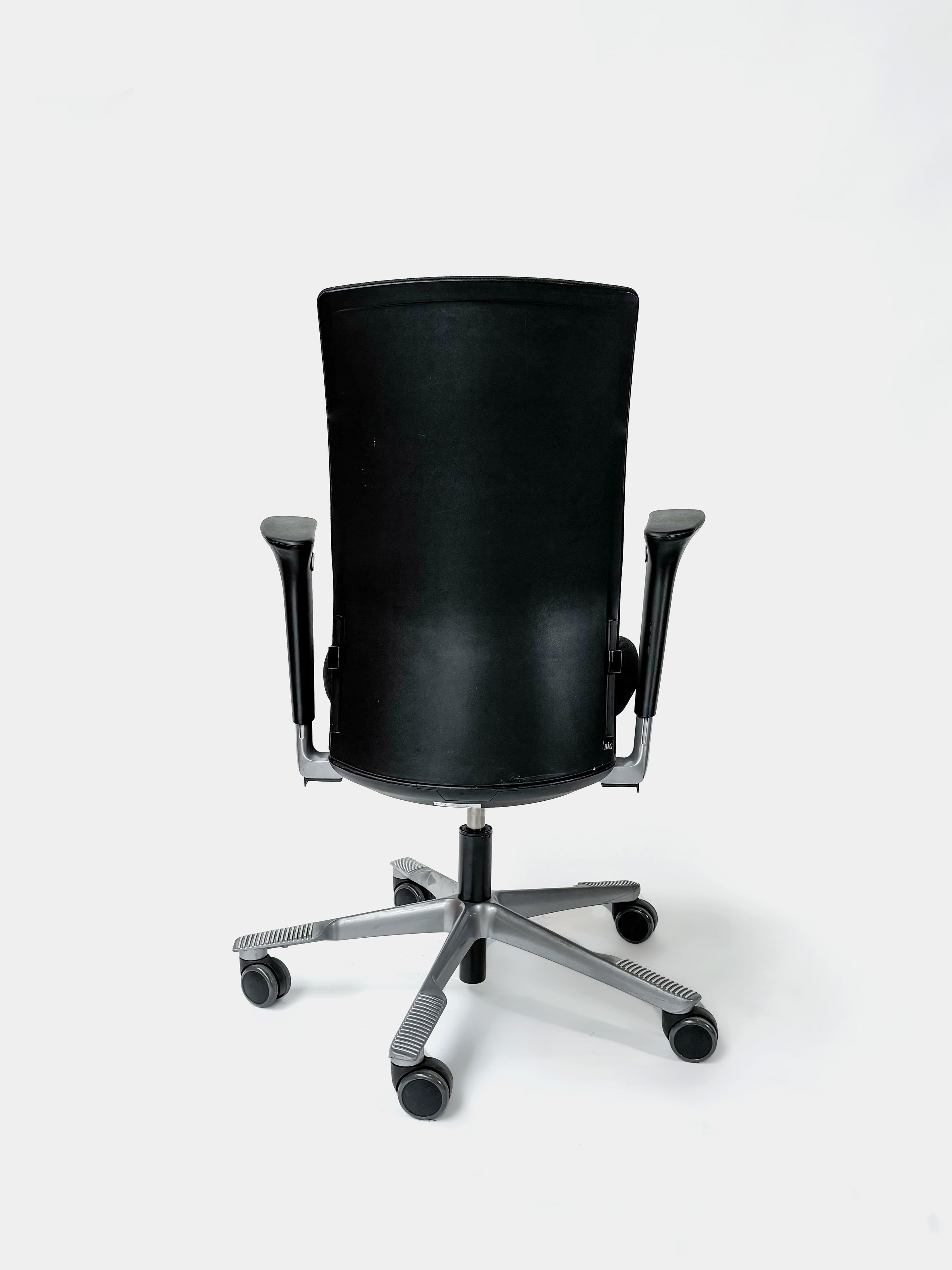 HAG Adjustable black office chairs on wheels-6