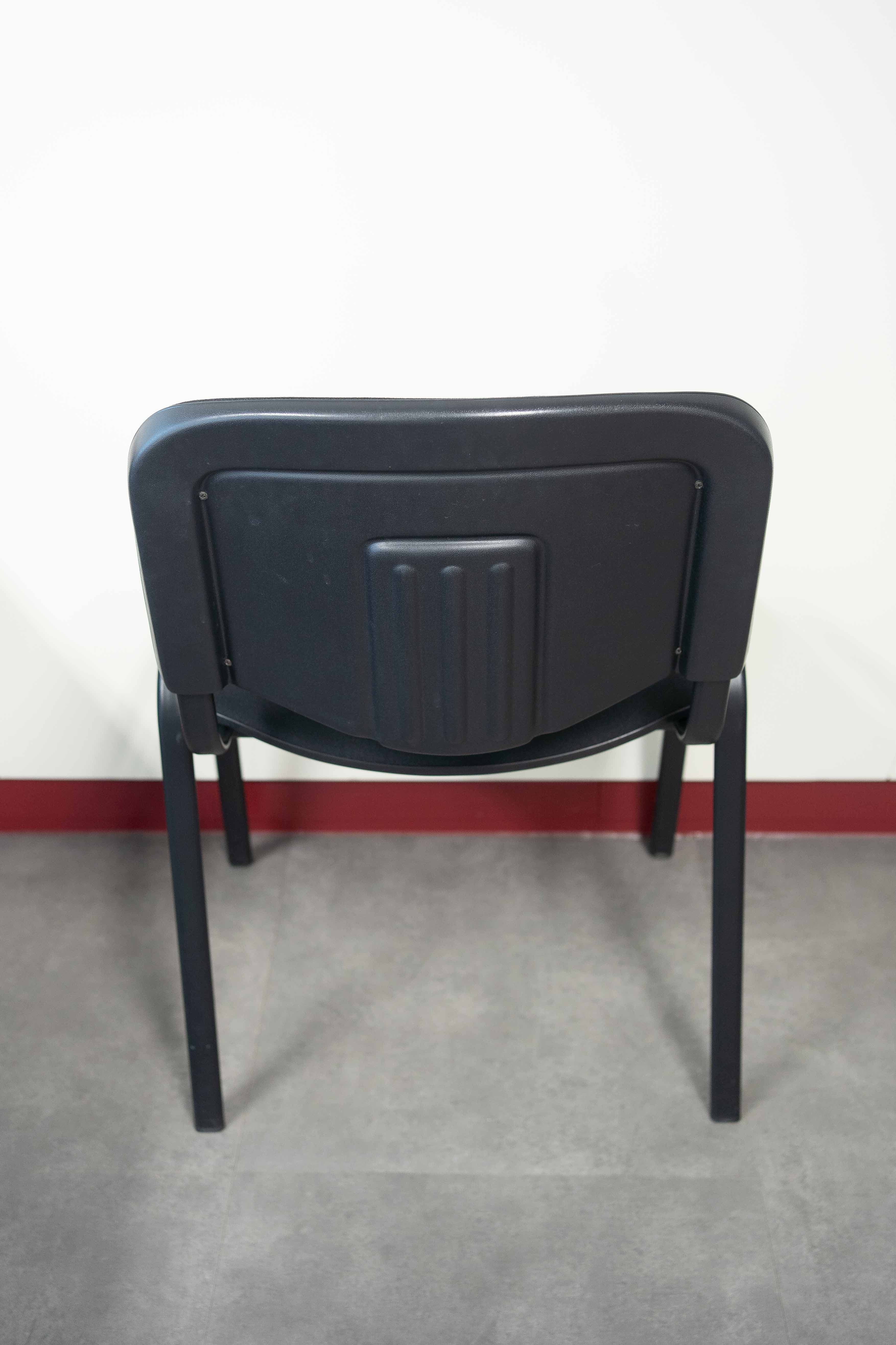 Black stackable chair with black legs-1