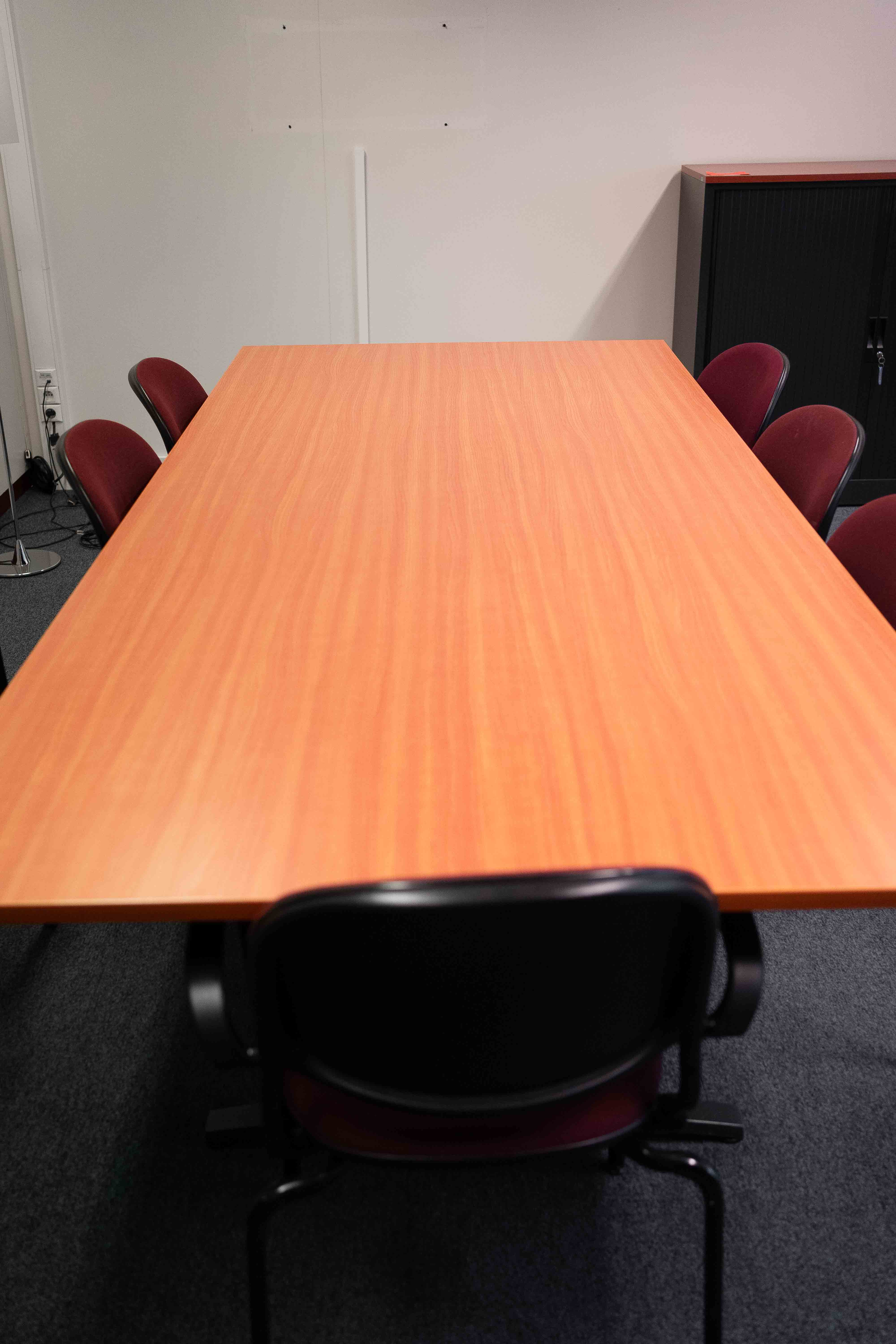 Large orange wood meeting table with T dark Grey legs 280cm-1