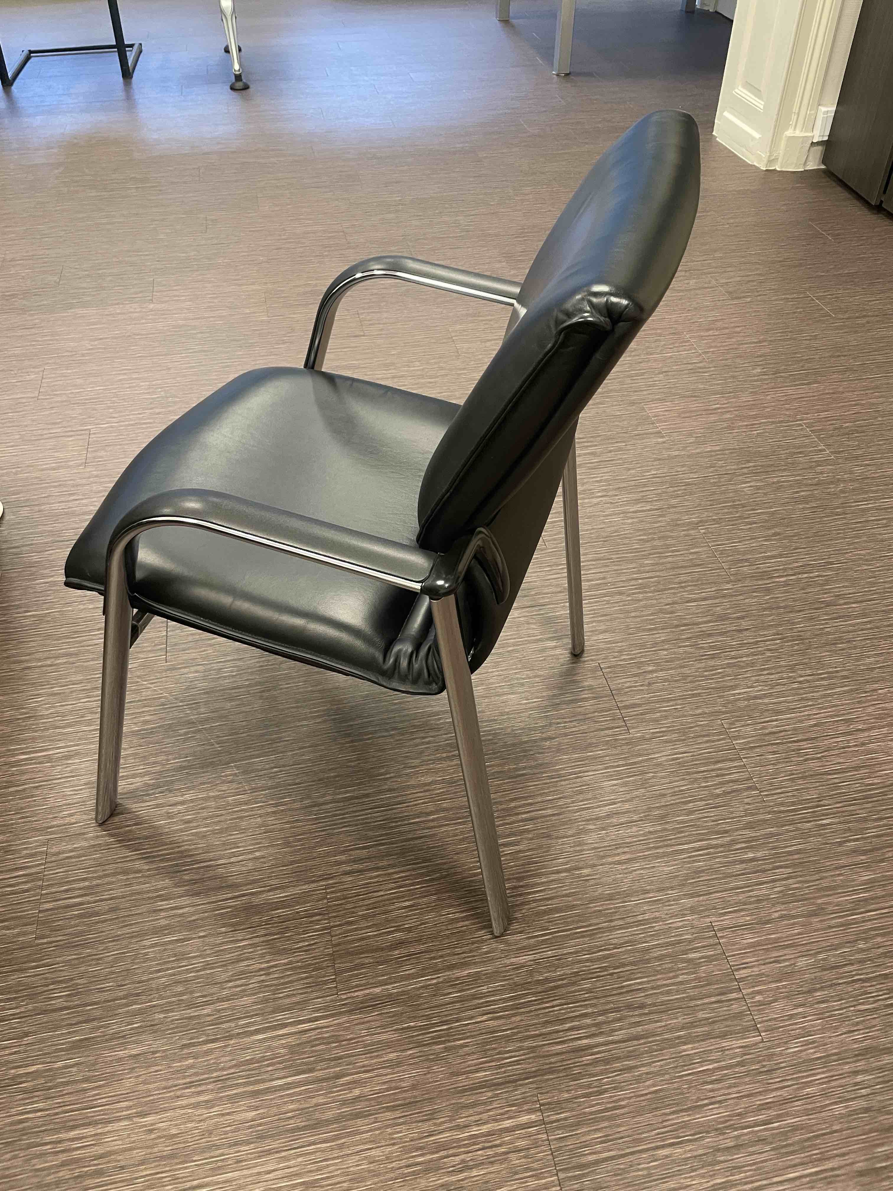 Comforto black leather chair on steel legs-4