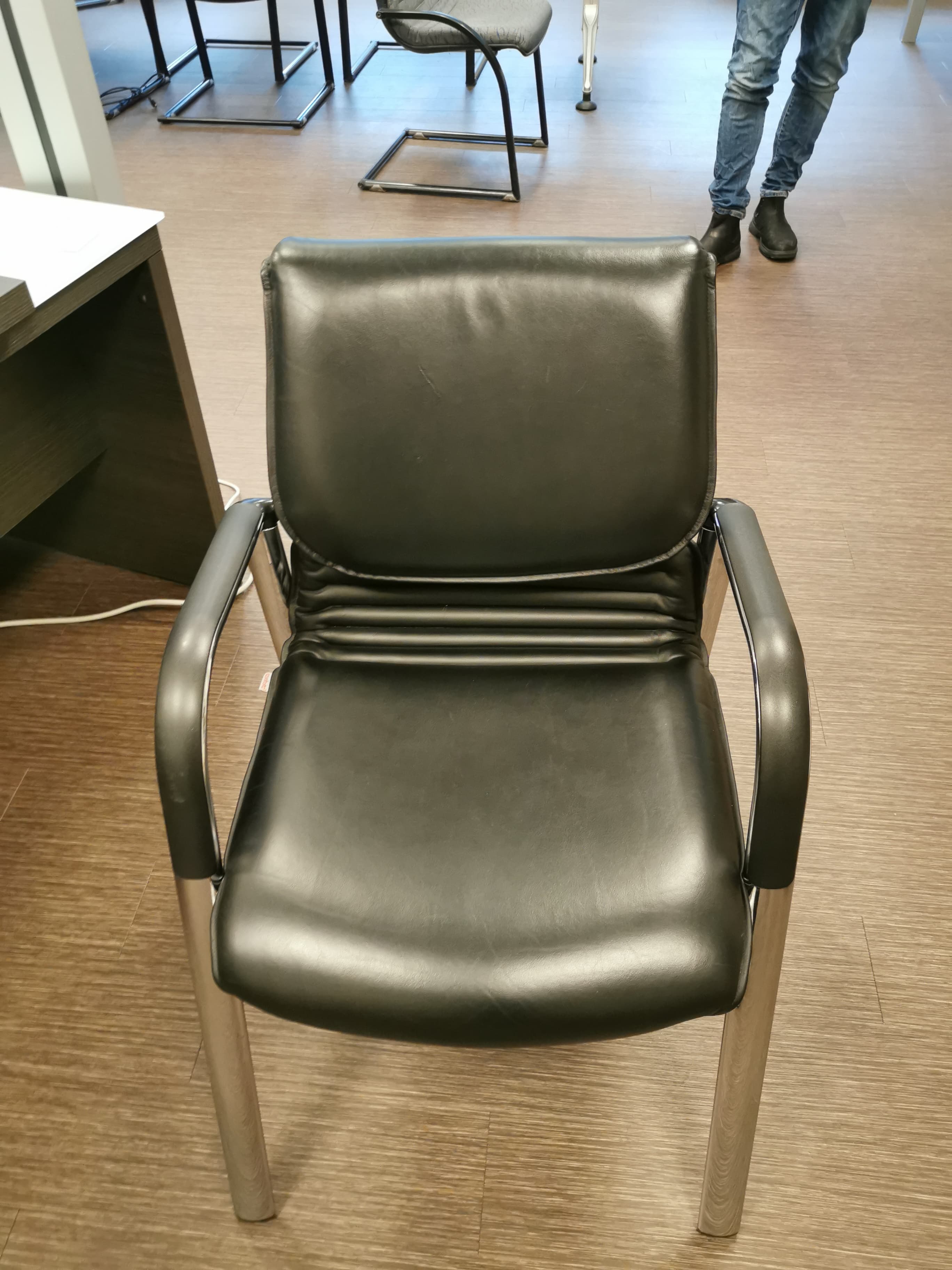 Comforto black leather chair on steel legs-3