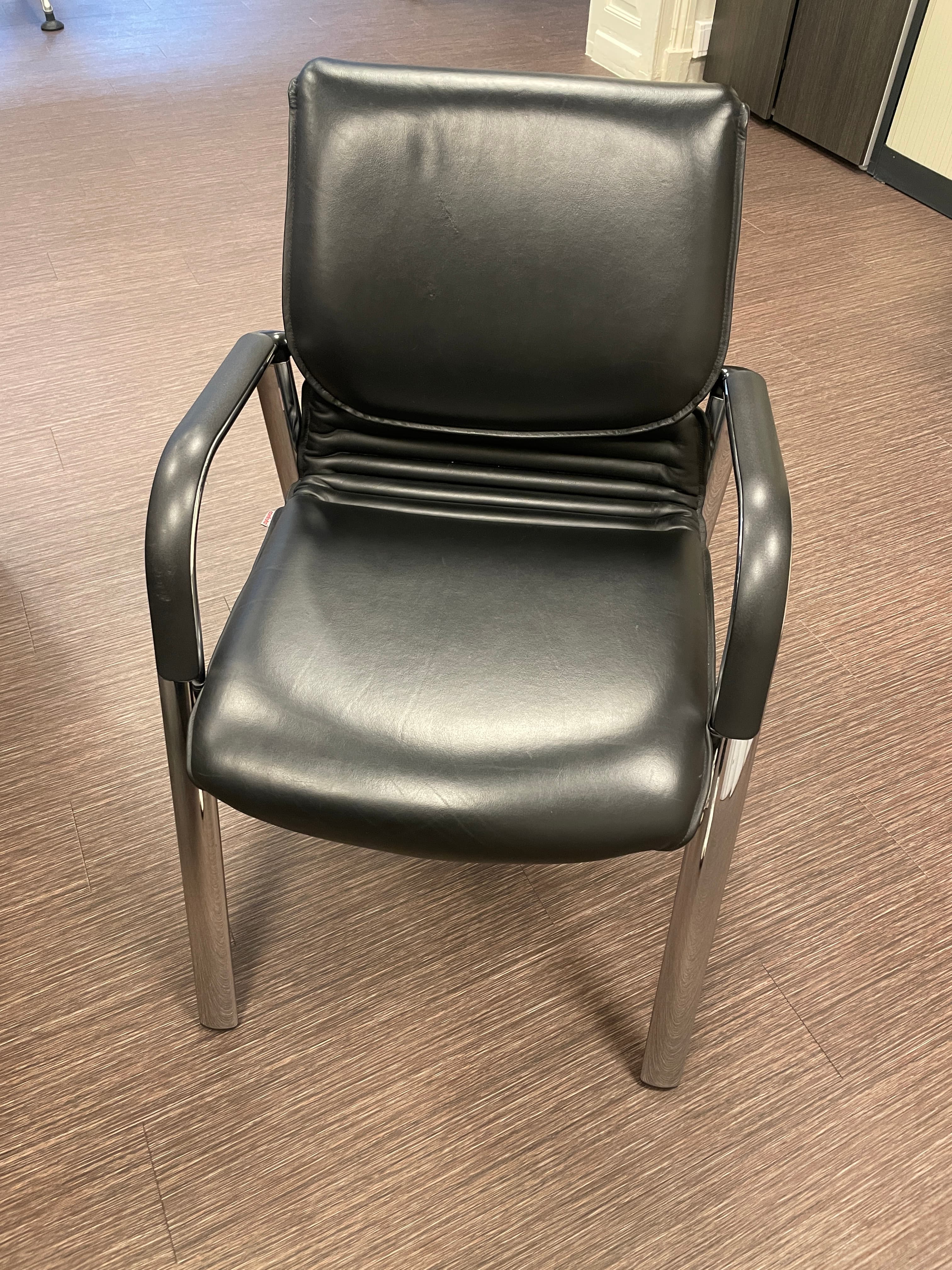 Comforto black leather chair on steel legs-1
