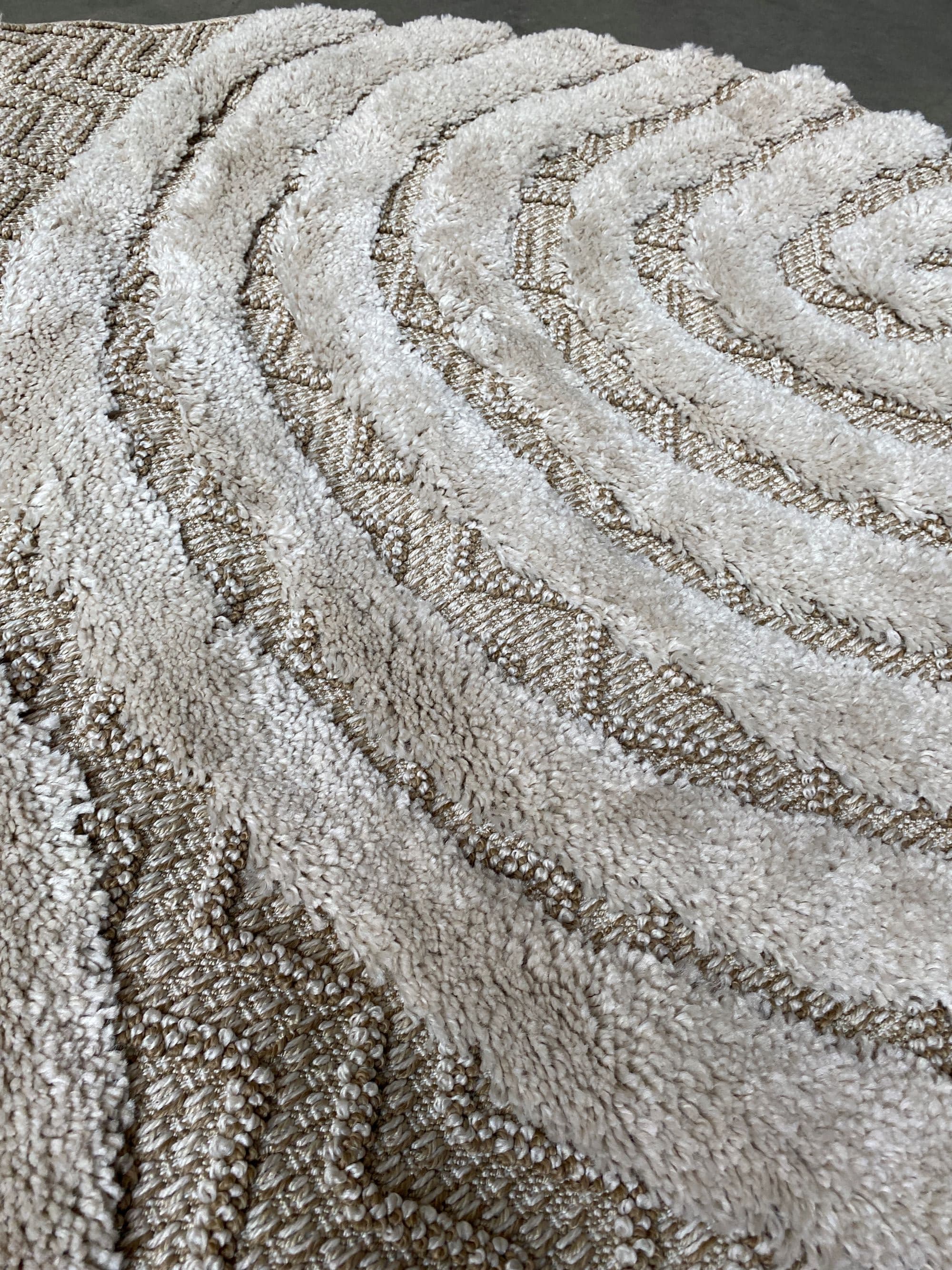 Beige fabric round rug with textured pattern-1