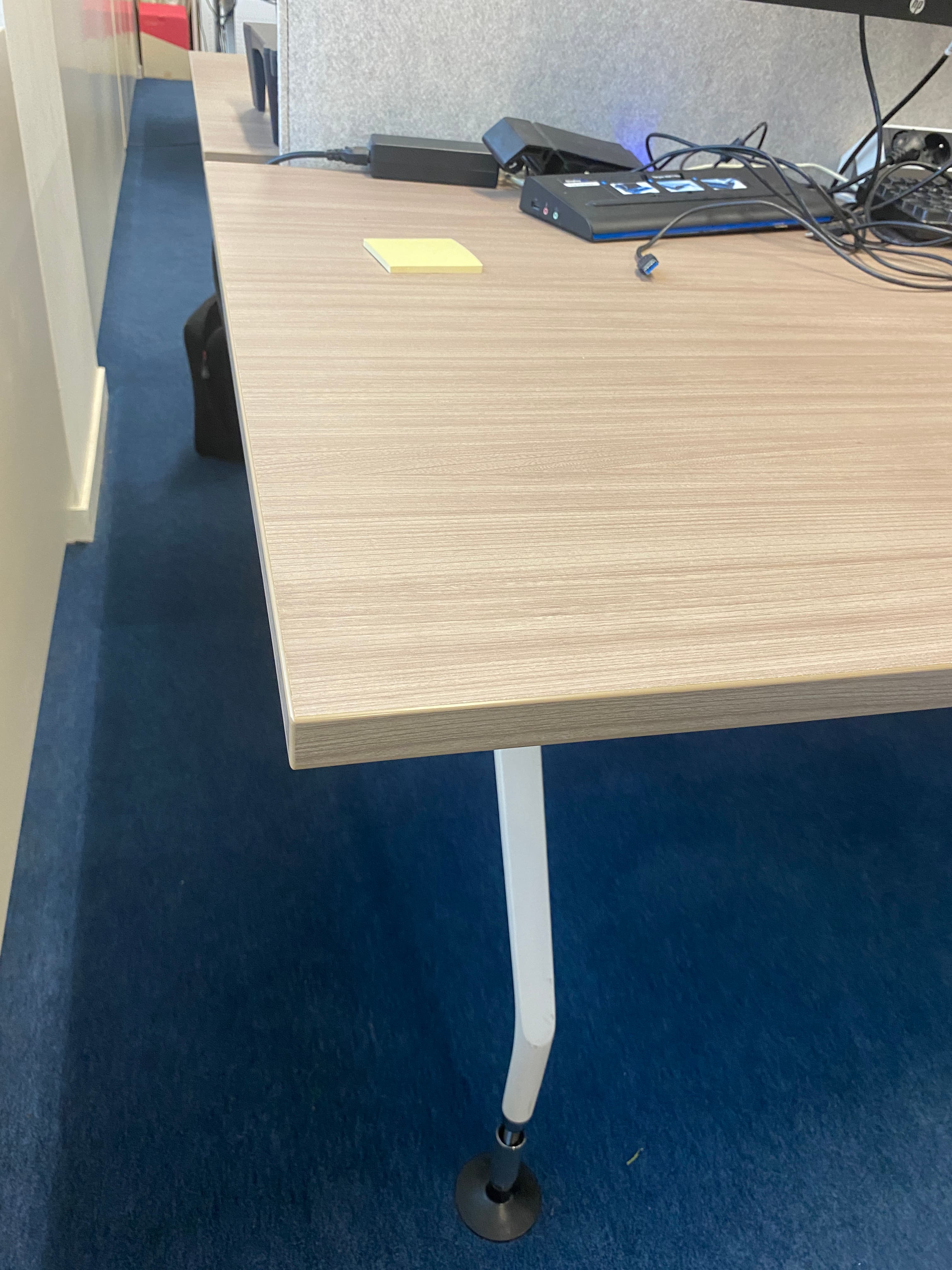 Vitra 4 person wood desk with white metallic legs with light grey buzzispace acoustic panel-2