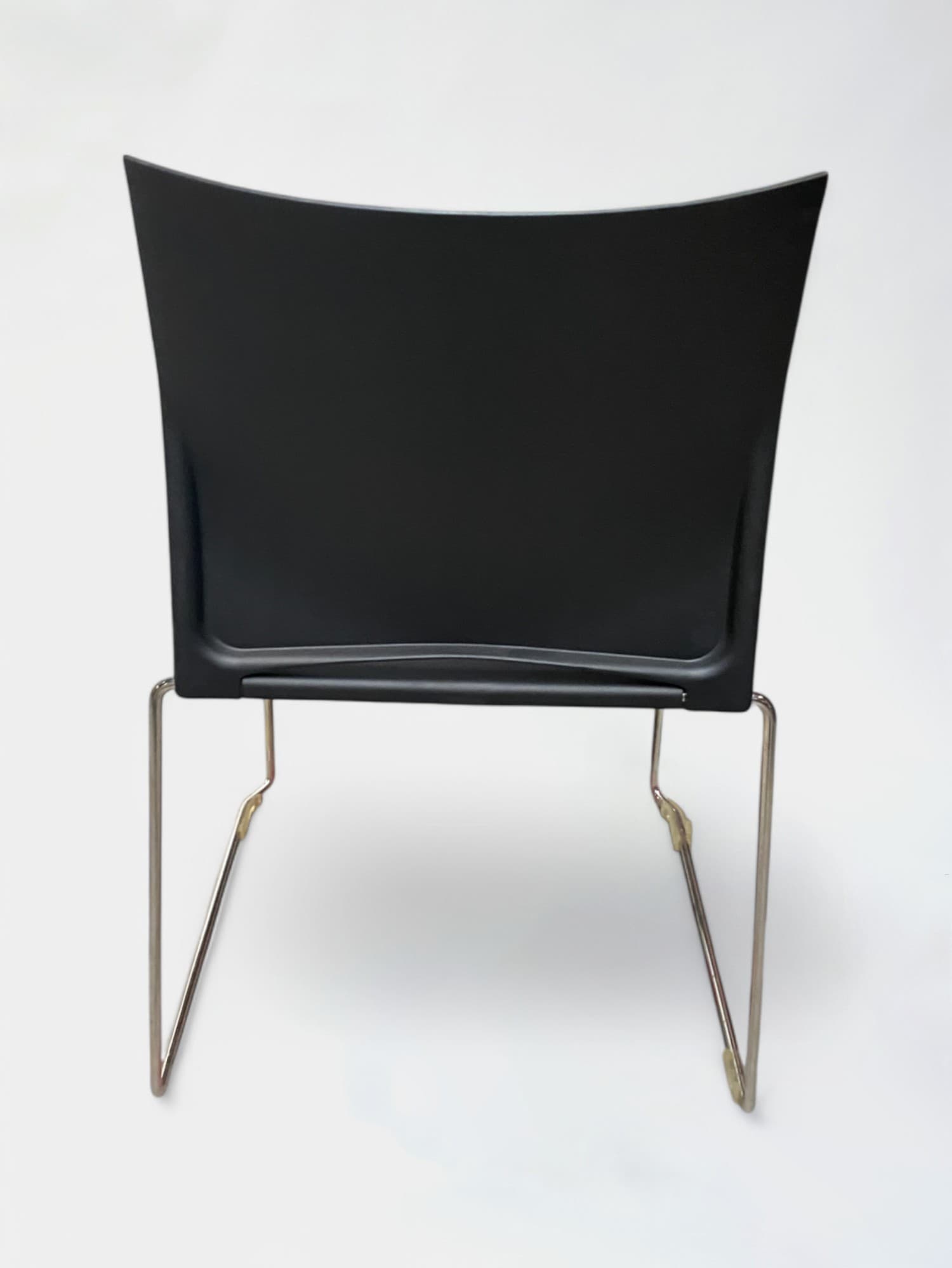 Black plastic chair on steel legs-3