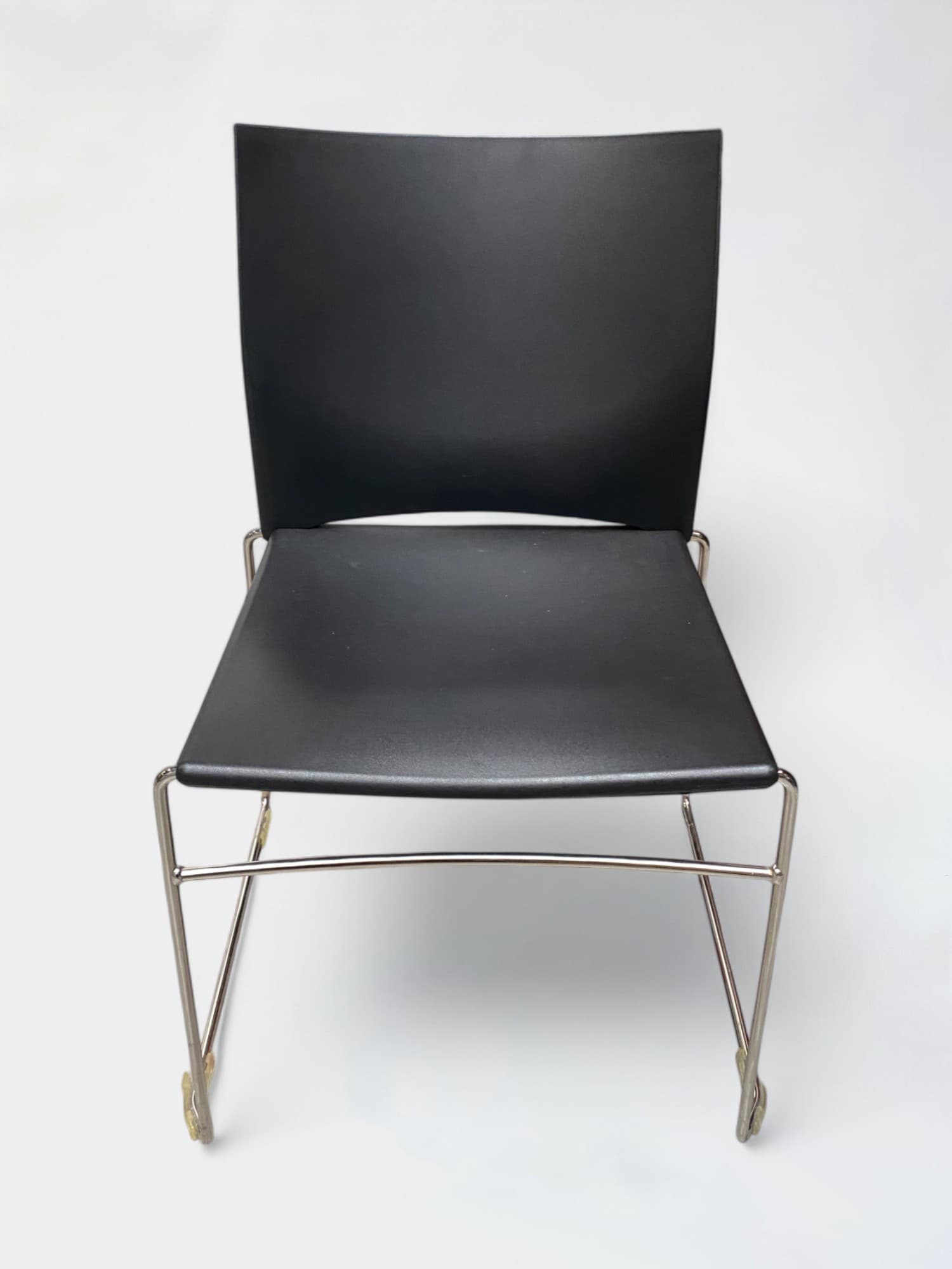Black plastic chair on steel legs-1
