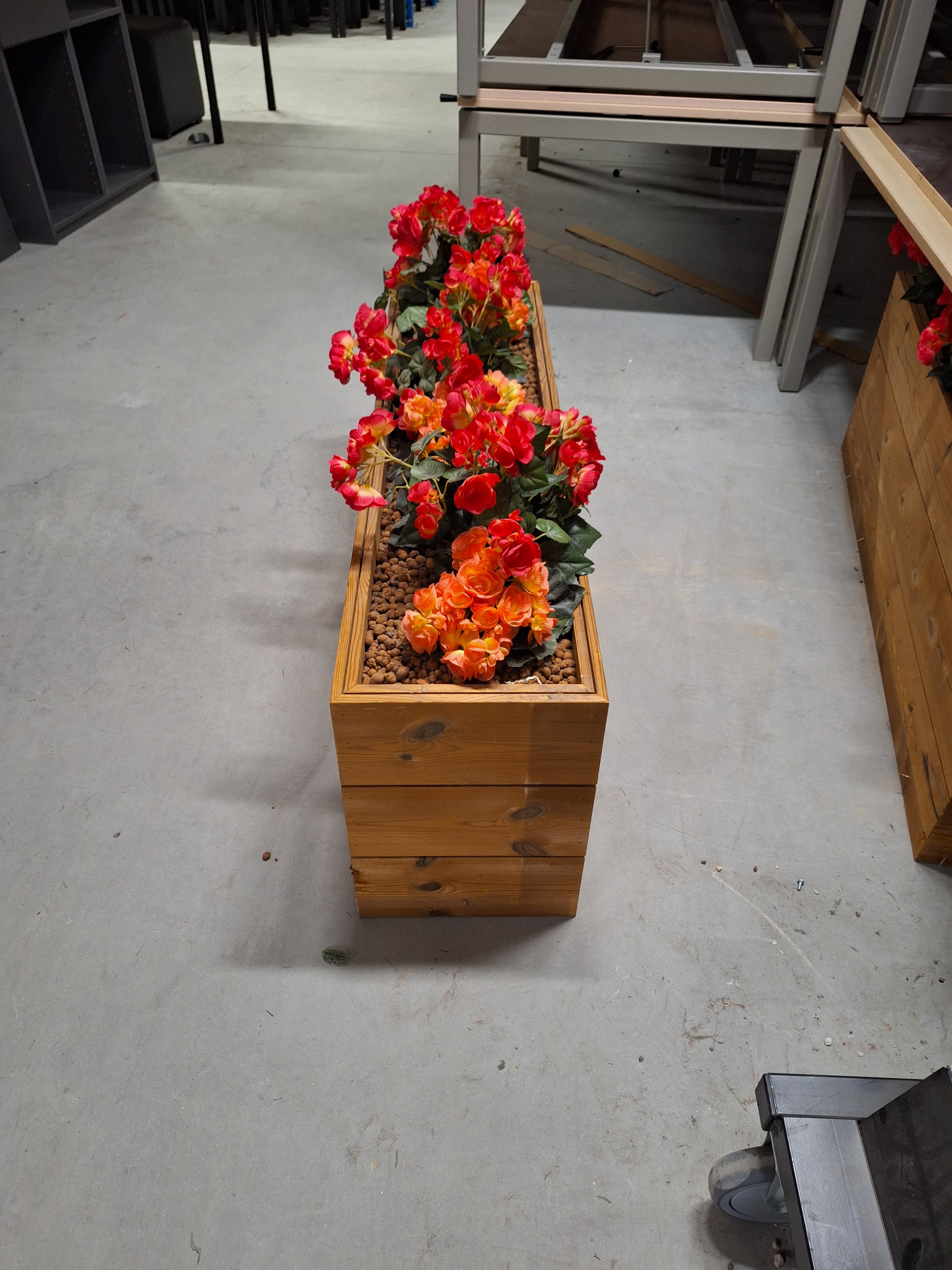 Fake red flowers in wooden pot-1