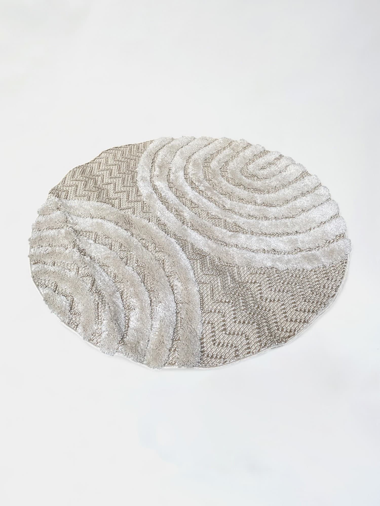Beige fabric round rug with textured pattern-0