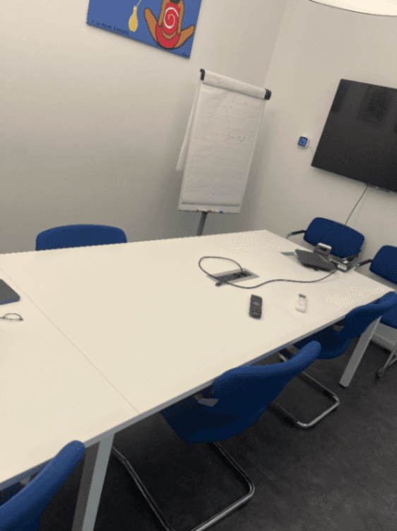 White meeting table with top access