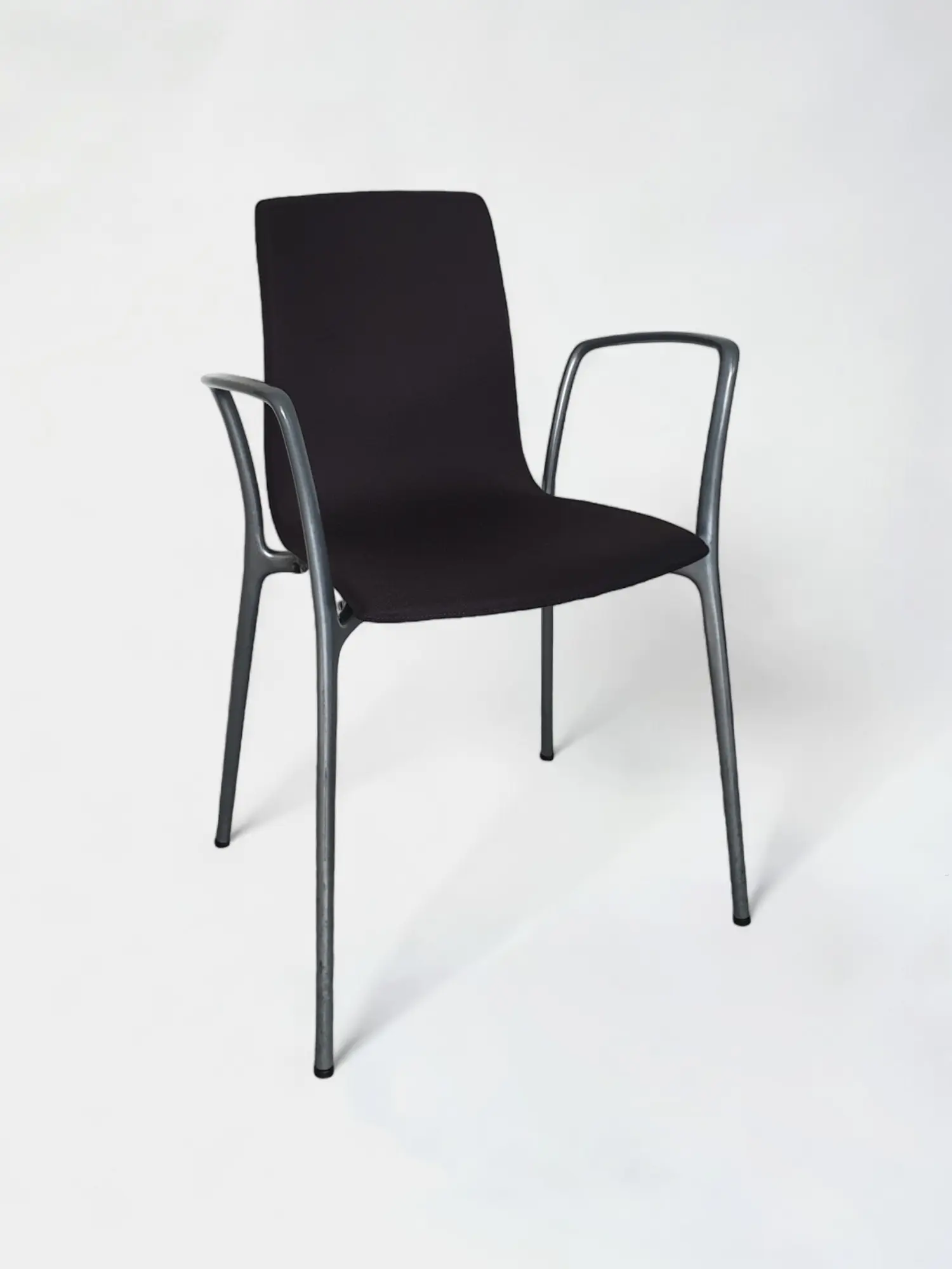 Stackable faux leather chair with steel legs and armrests-0