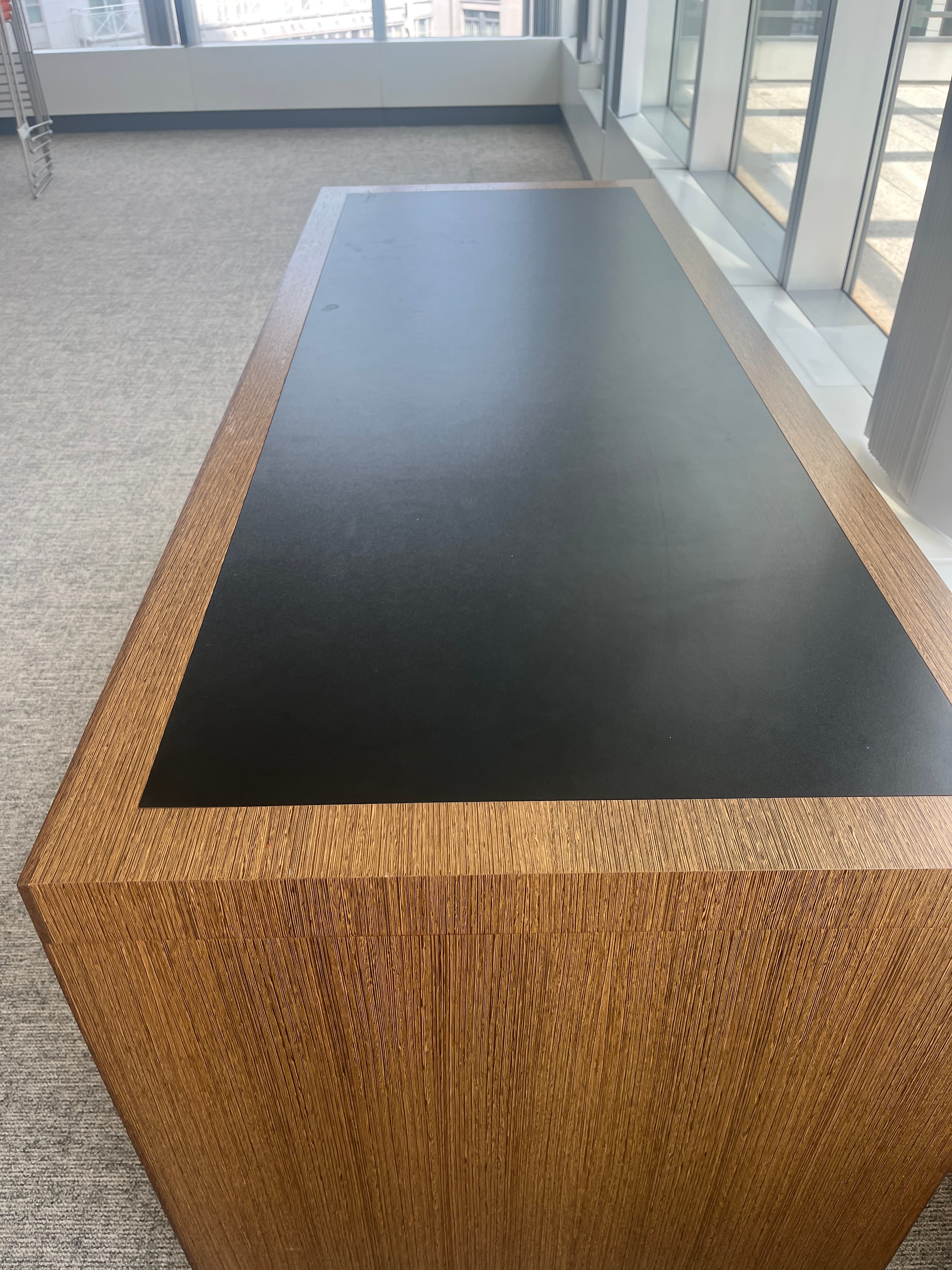 Brown wood rectangular table with a black top-3