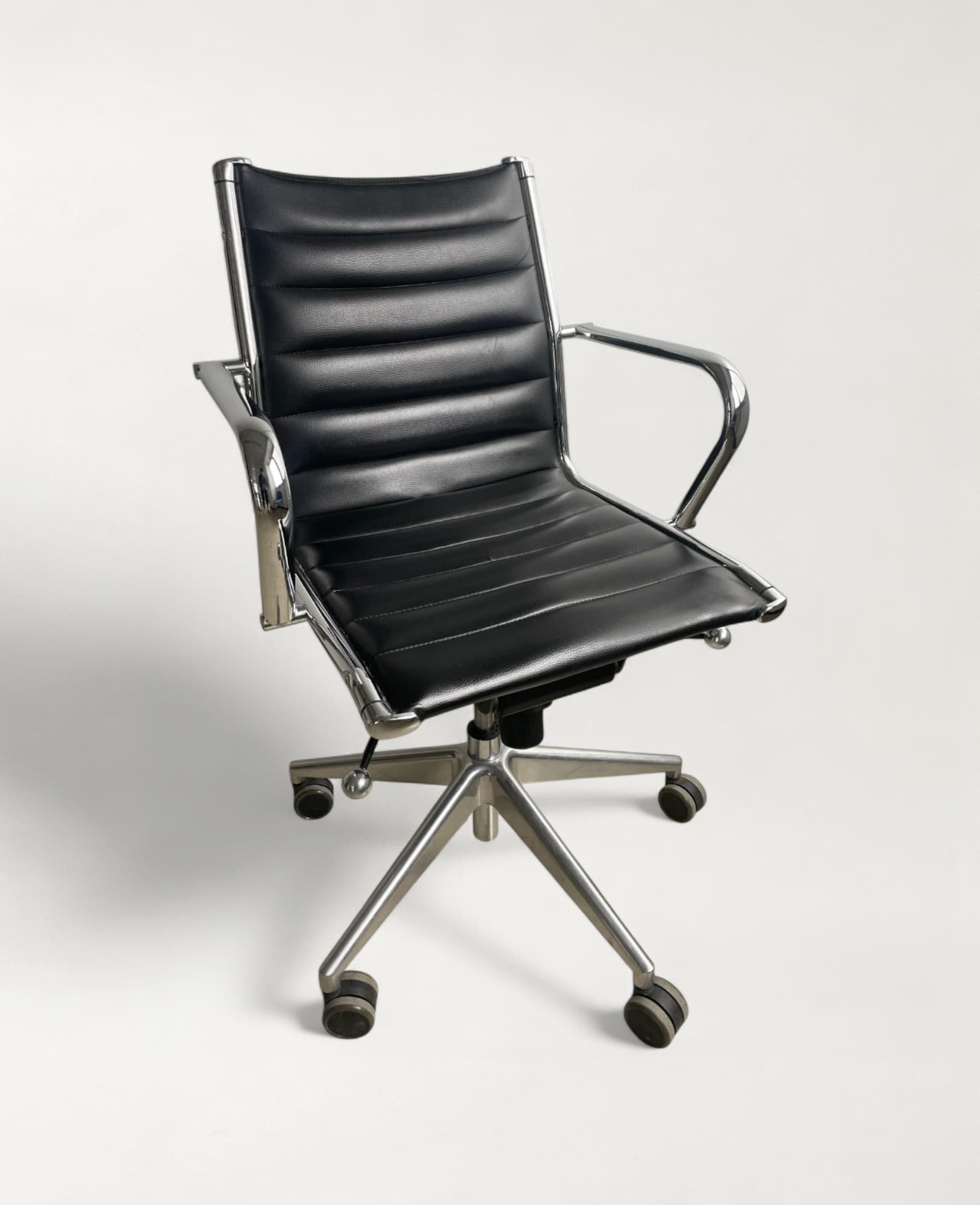 Sitland black leather office chair on wheels with damage-0