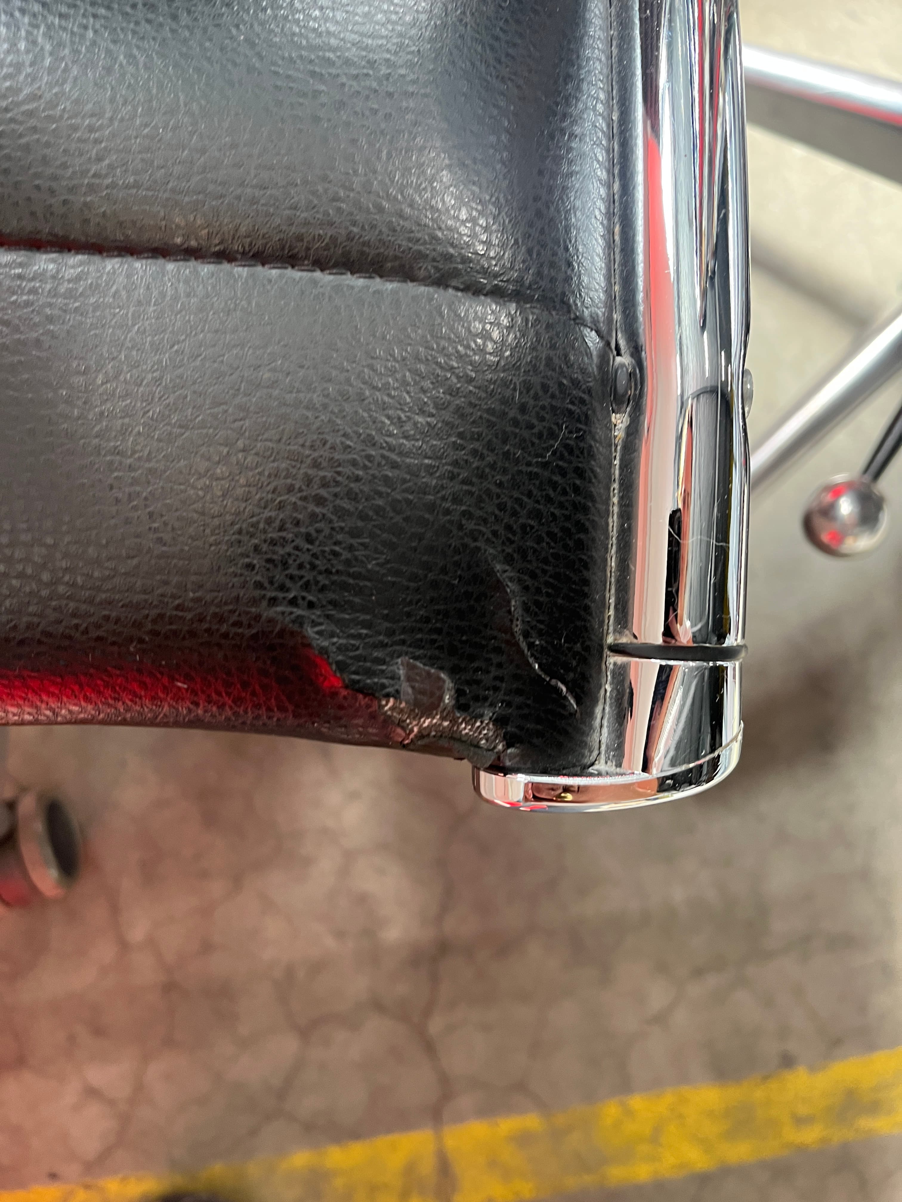 Sitland black leather office chair on wheels with damage-1