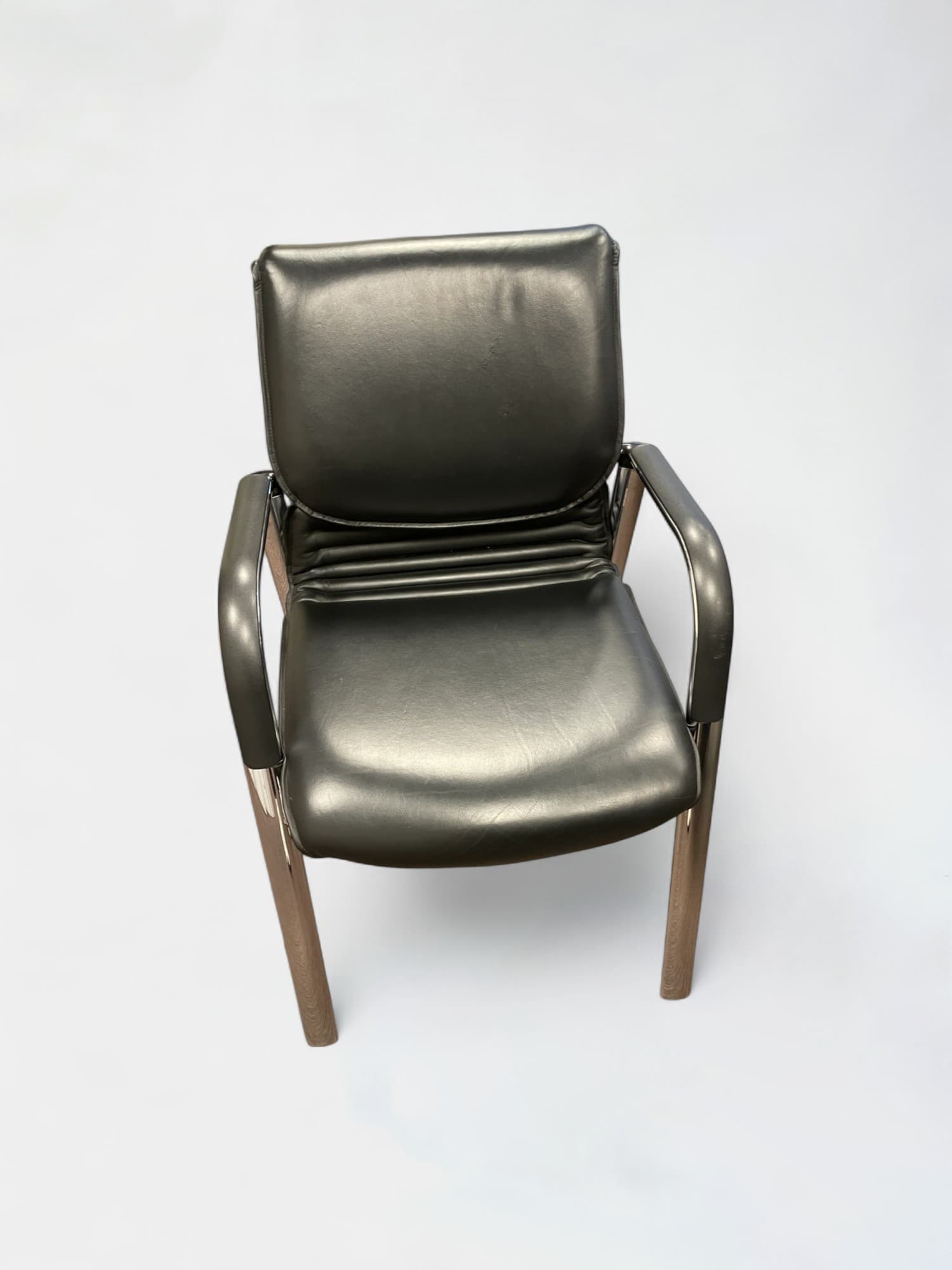 Comforto black leather chair on steel legs-0