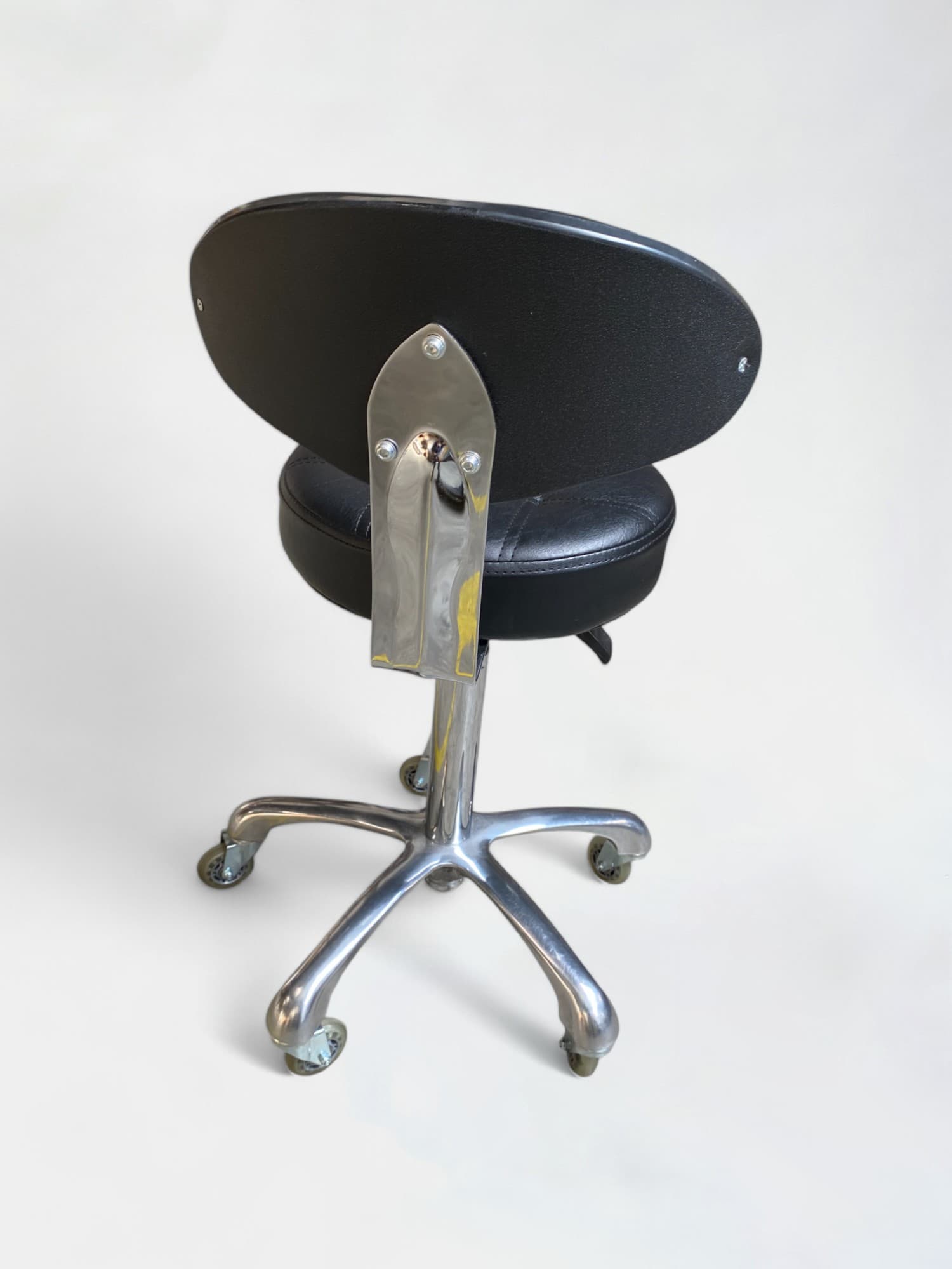 Black synthetic leather stool with wheels-1