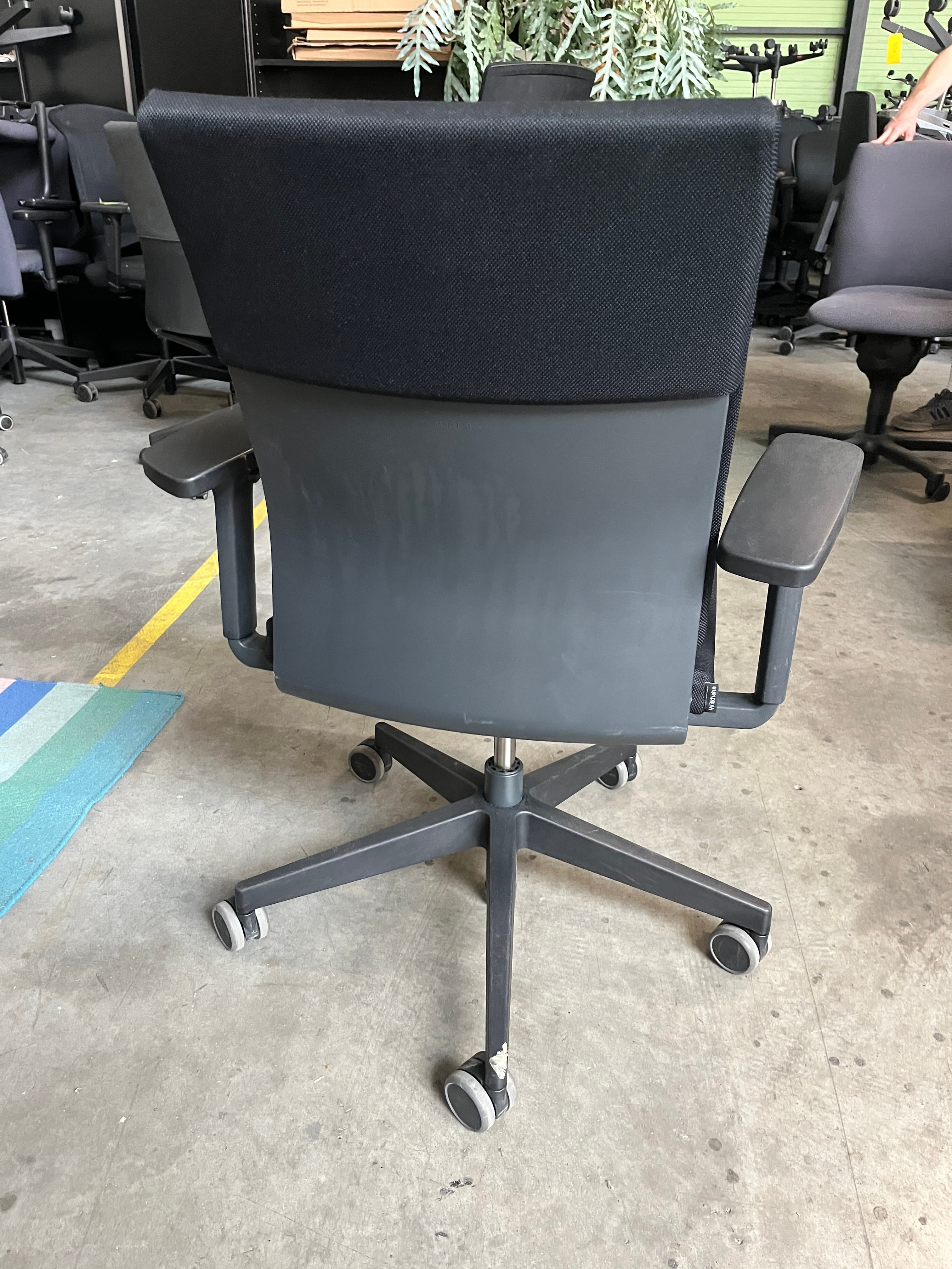 Vitra black office chair on black wheels-1