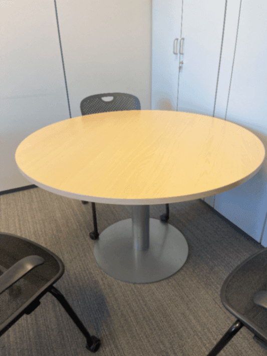 Laminate round table with grey leg