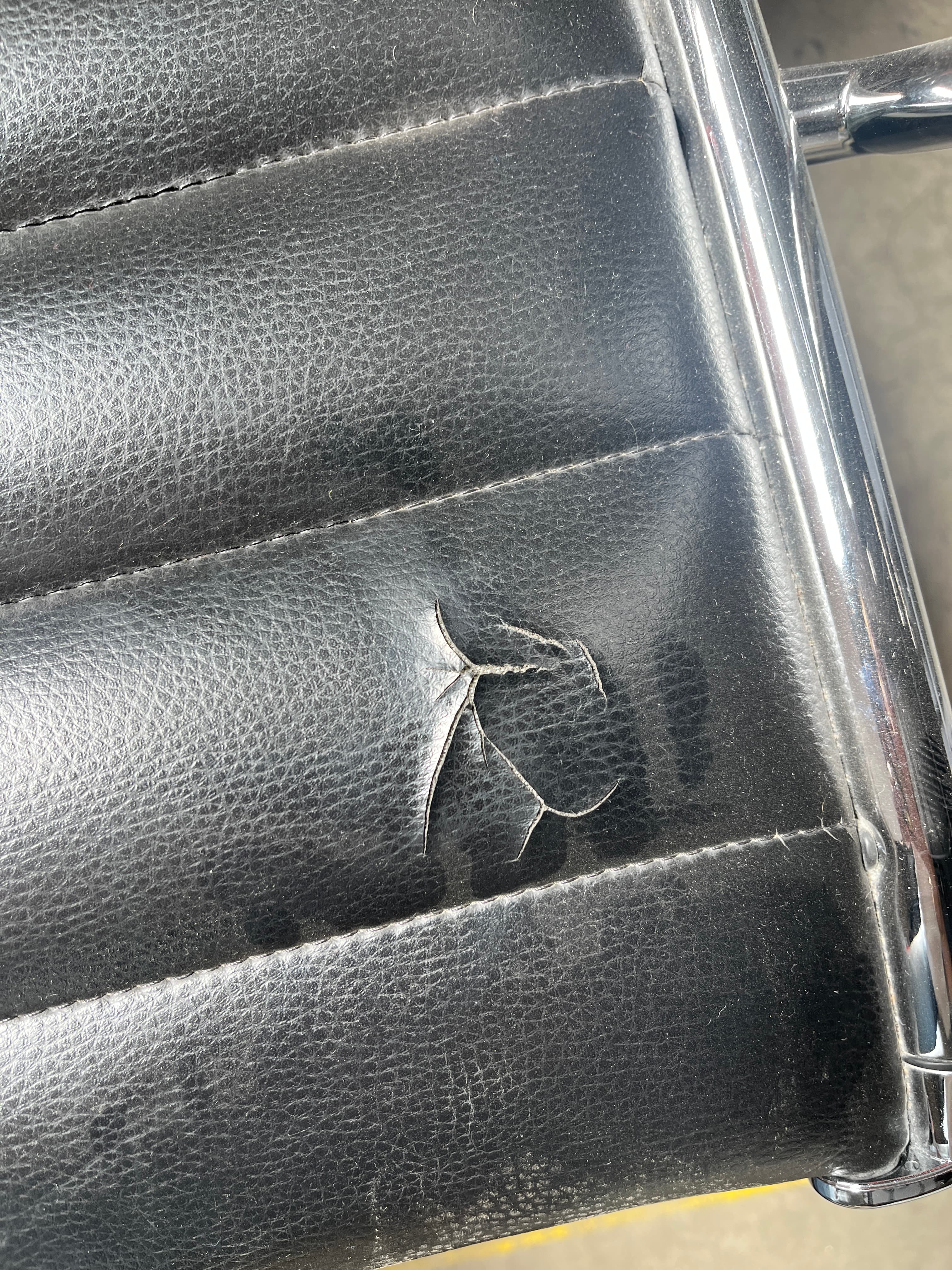 Sitland black leather office chair on wheels with damage-0