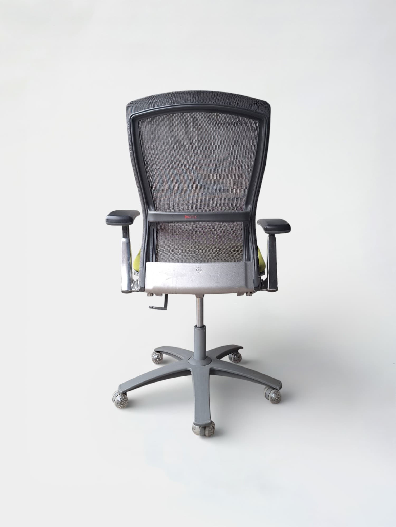 Knoll Adjustable office chair with green seat and grey mesh back on wheels-3