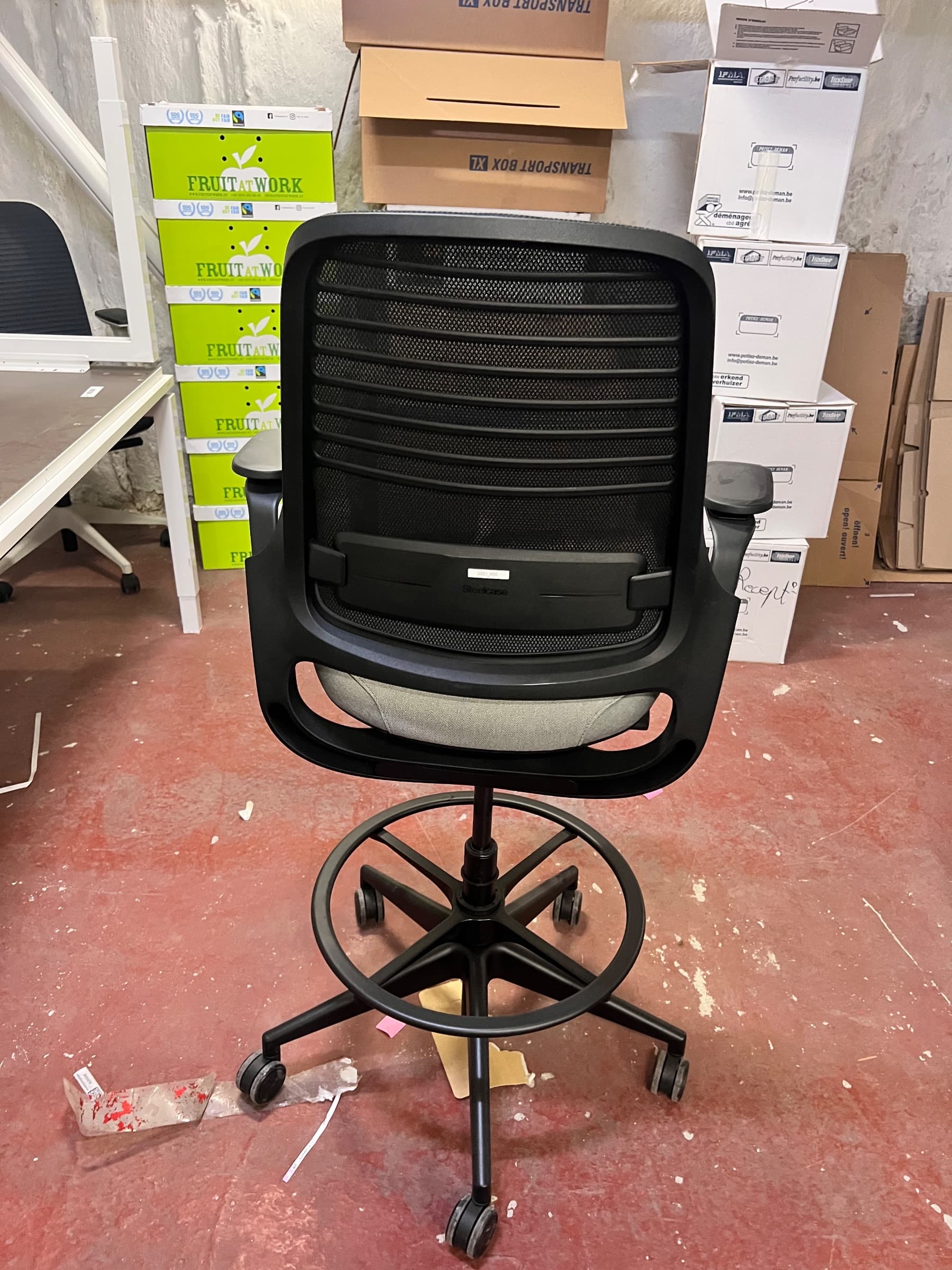 Black mesh and gray fabric office chair with adjustable height and armrests-1